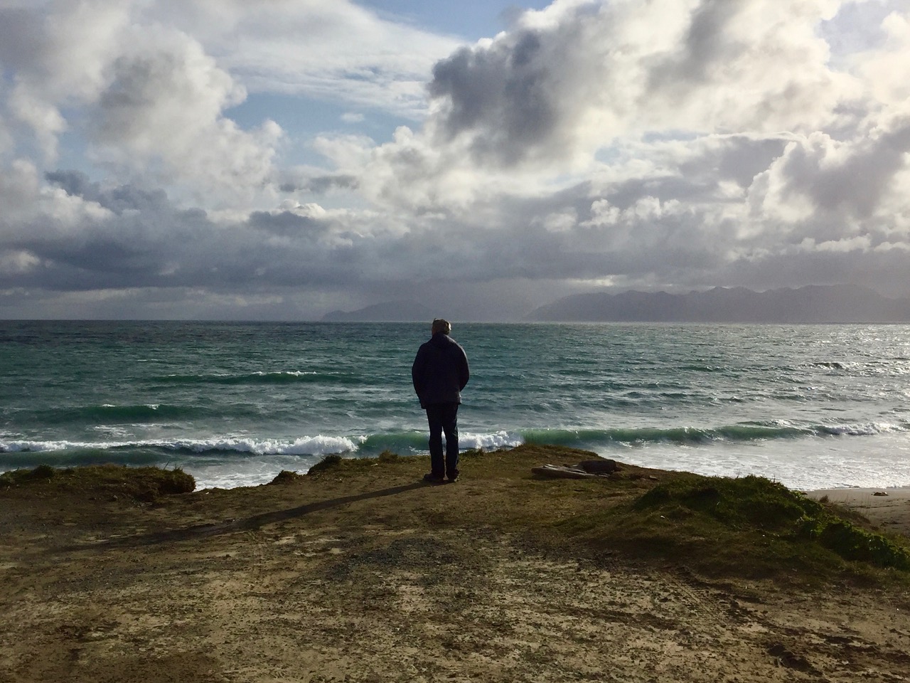 Man (Todd) standing alone before ocean.jpeg