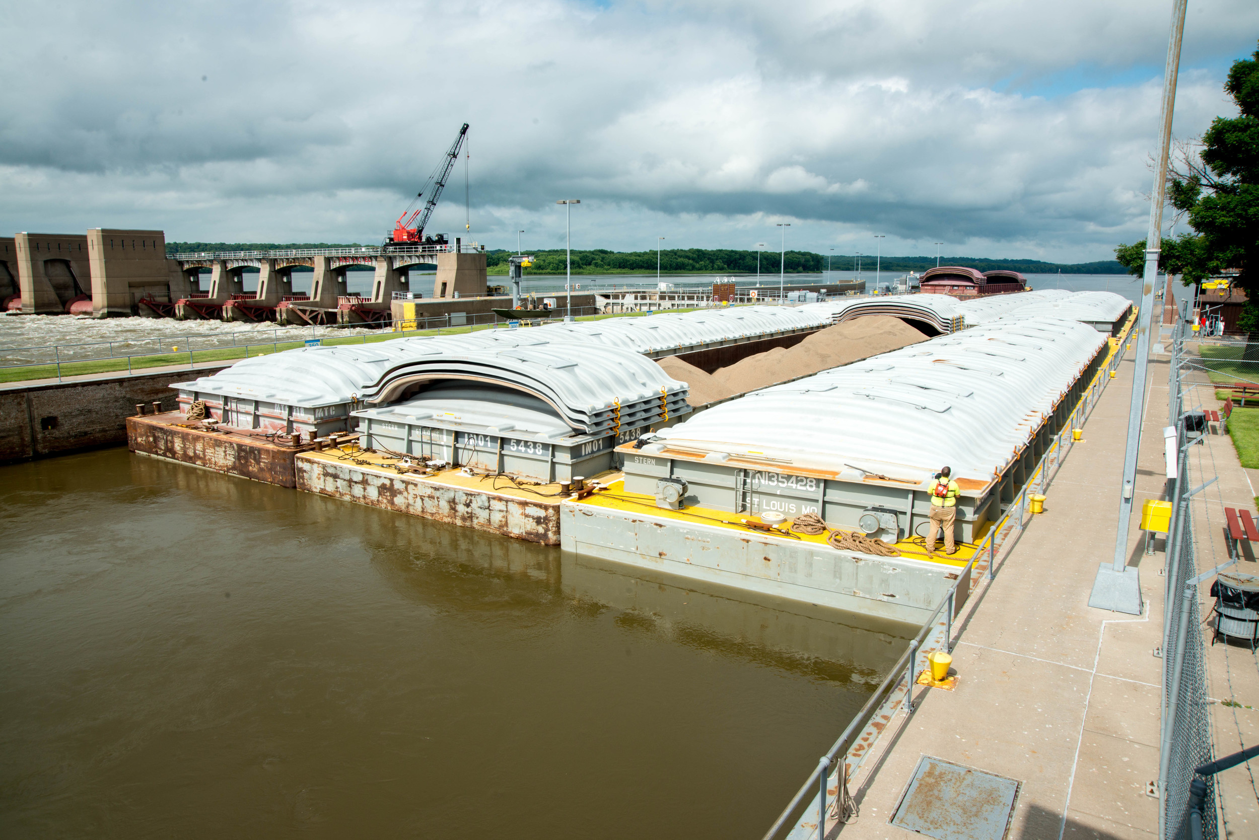  When a larger section of barges was being transported, it would be separated into sections and then pushed and winched through the locks. This is why (to our acute frustration) they always take some a lofty amount of time. They push through sections