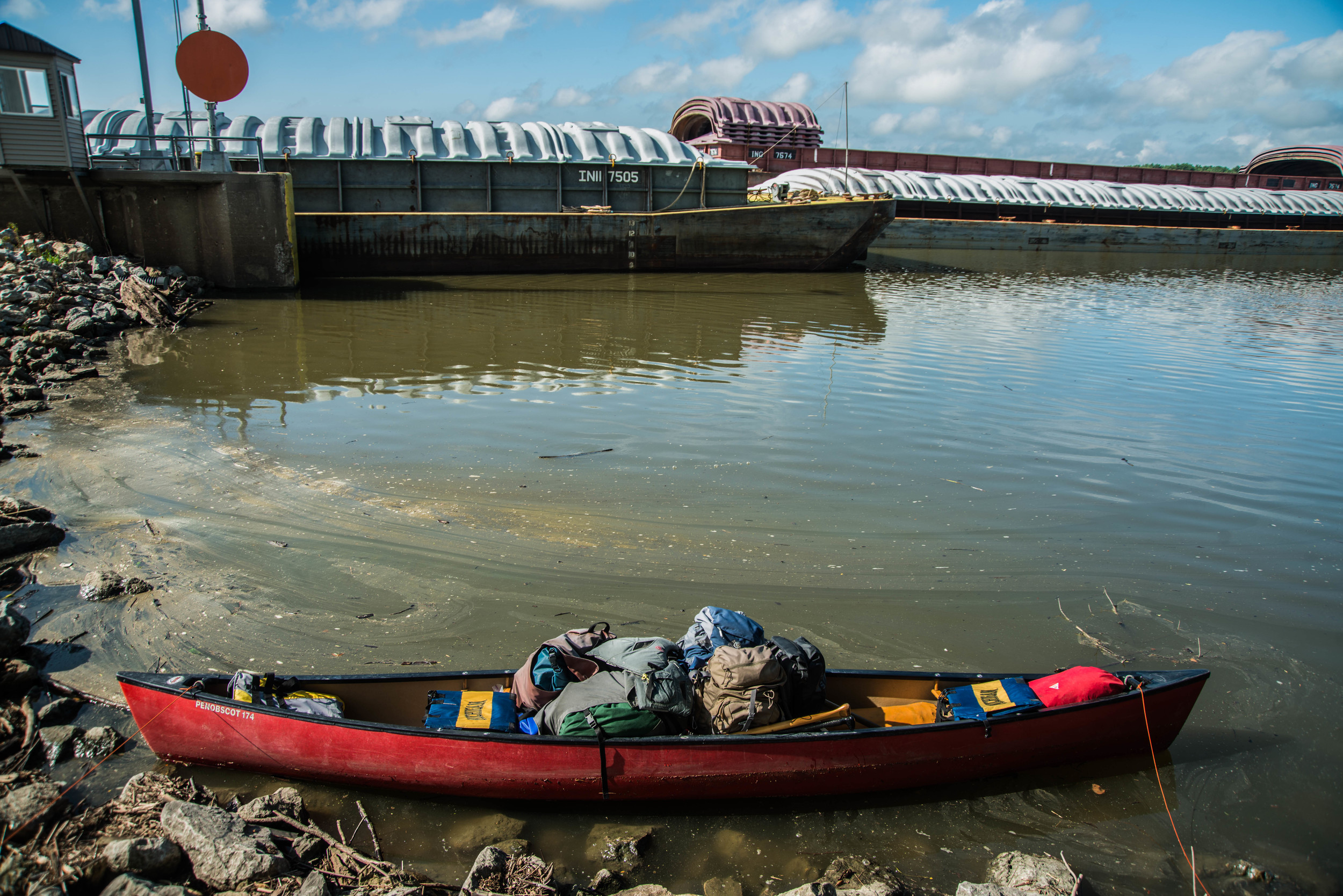 Our majestic vessel waiting patiently for a giant brute of a barge to make its staggered, cumbersome exit from a lock system.