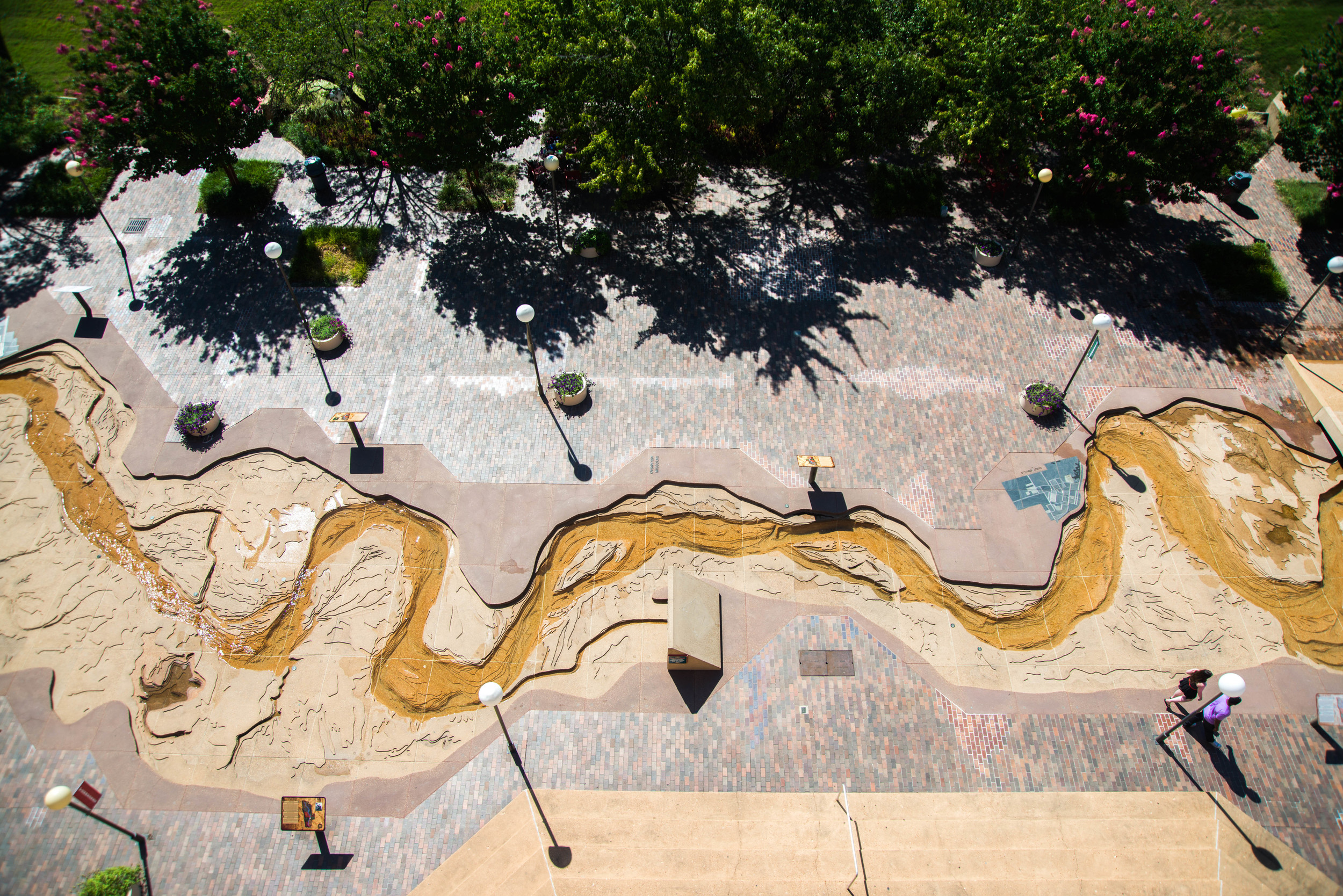 The only time the Mississippi River wasn't an imposing, commanding force was when it was a few feet wide and we could stand on both the East and West banks at the same time. Another frame of the Mud Island Mississippi River model outside of Memphis, TN.