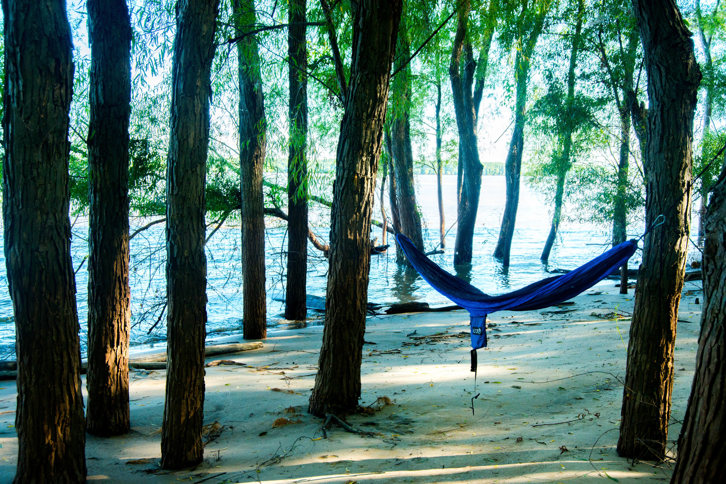 My shelter for an evening. Even the nylon fabric of an old hammock was enough to give me a sense of security and home.