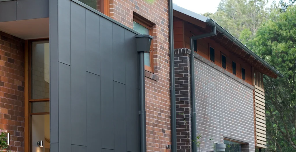 Conversion of an existing interwar 2 unit building in a heritage conservation area to a 5 bedroom luxury residence. the palette is timber & brick, the tone is relaxed but refined and the building integrates the garden spaces and maximises natural light despite less than ideal solar orientation.