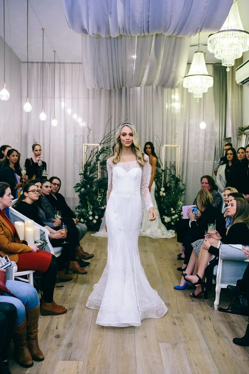 Media and guests were treated to the very first glimpses of the Ceremony collection, which saw models adorned with sparkling headpieces, hand-embellished gowns and the inaugural range of Anna Campbell earrings.