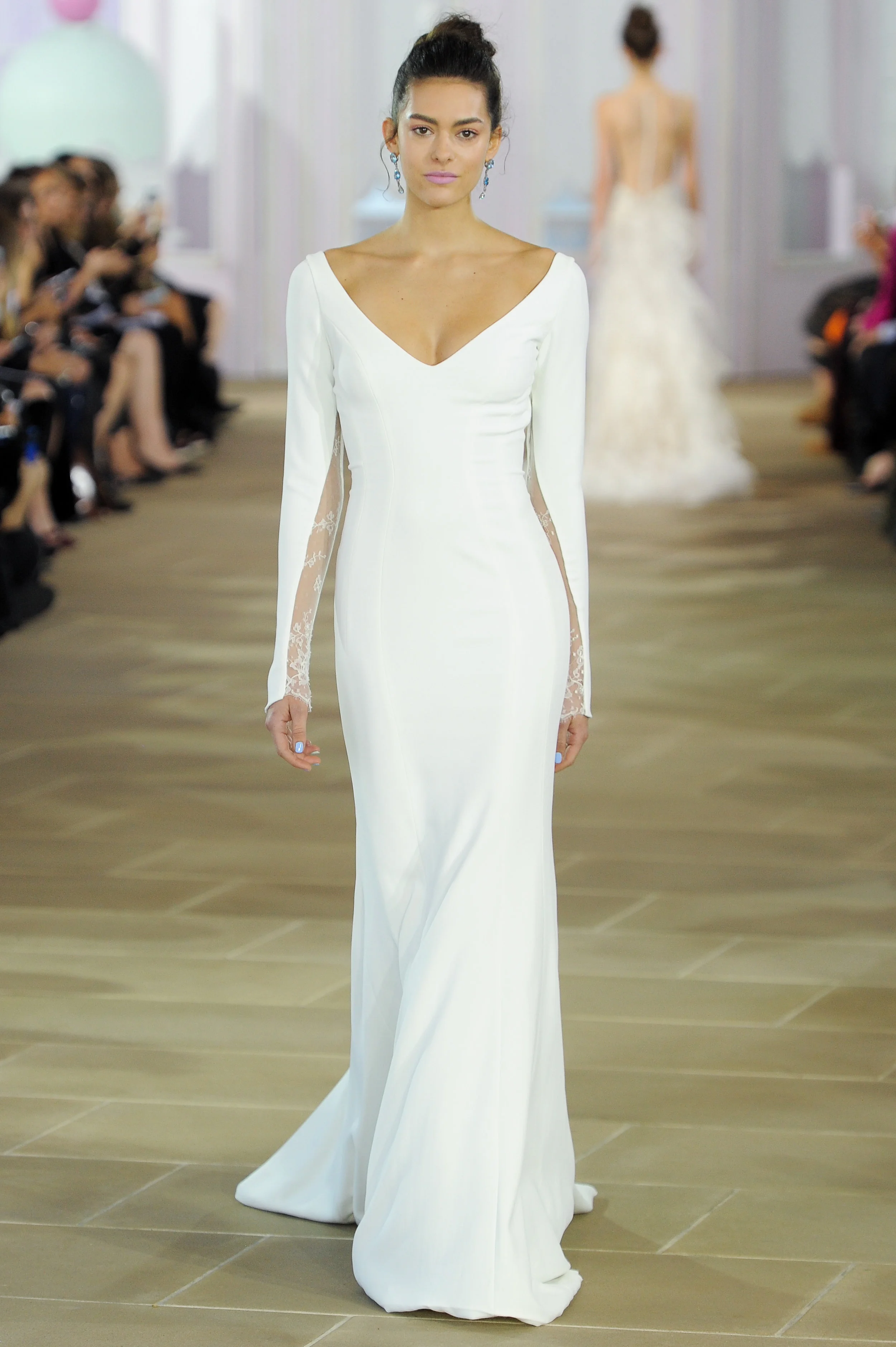 'Madeleine' - silk crepe trumpet gown with soft V-neck, long sleeves and lace inset detail. 