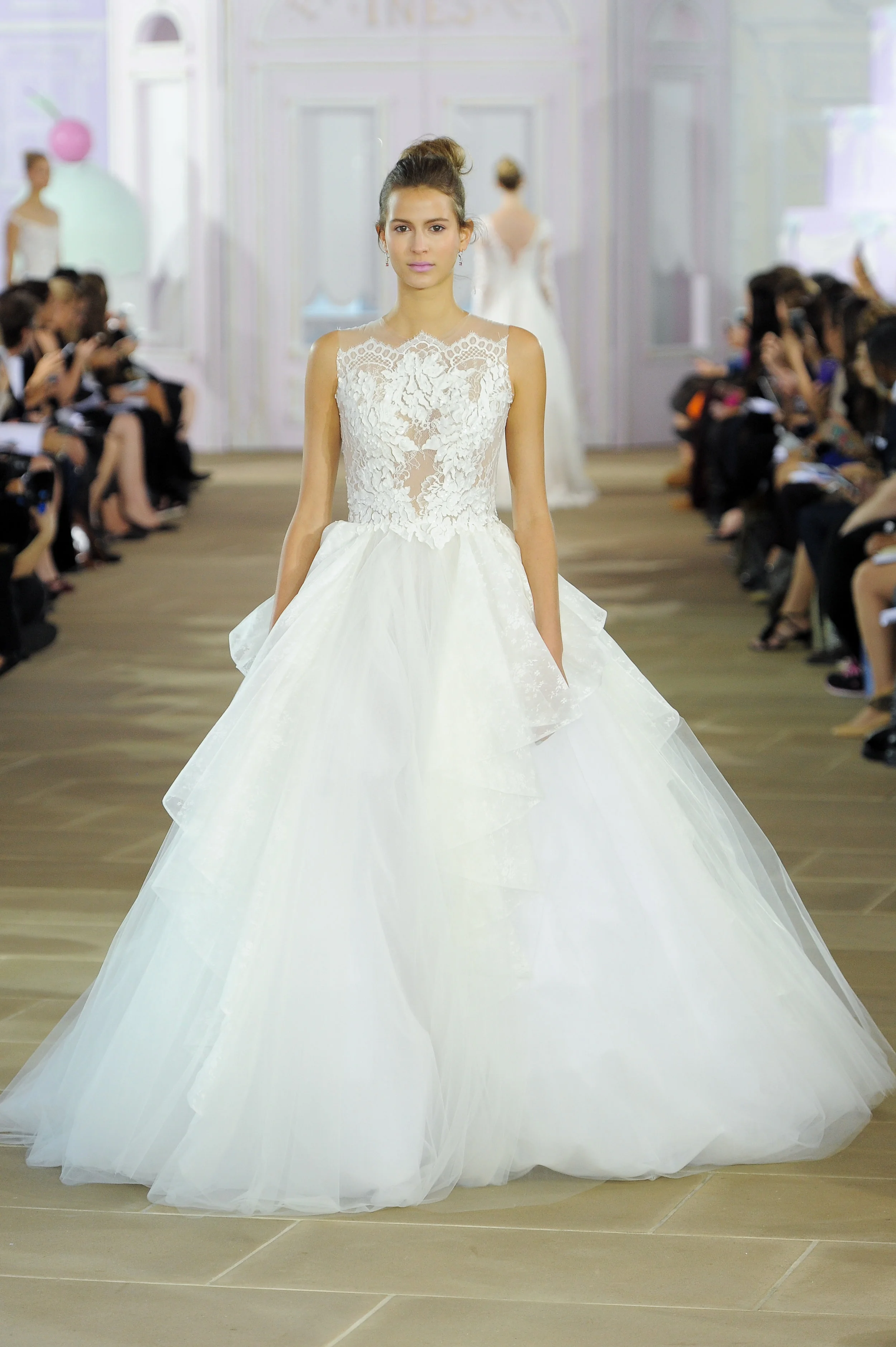 'Souffle' - sleeveless tulle ball gown with illusion bodice and back, lace appliqués and cascading tulle skirt and train.