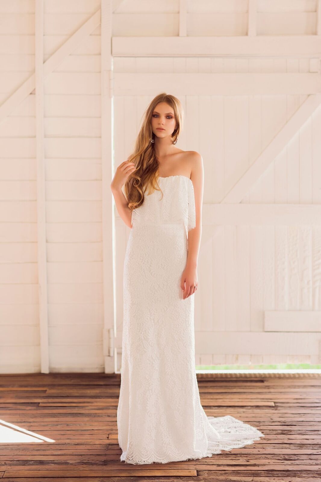 'Petra' - f lounce silk white lace bodice gown with slimline lace skirt with long train.