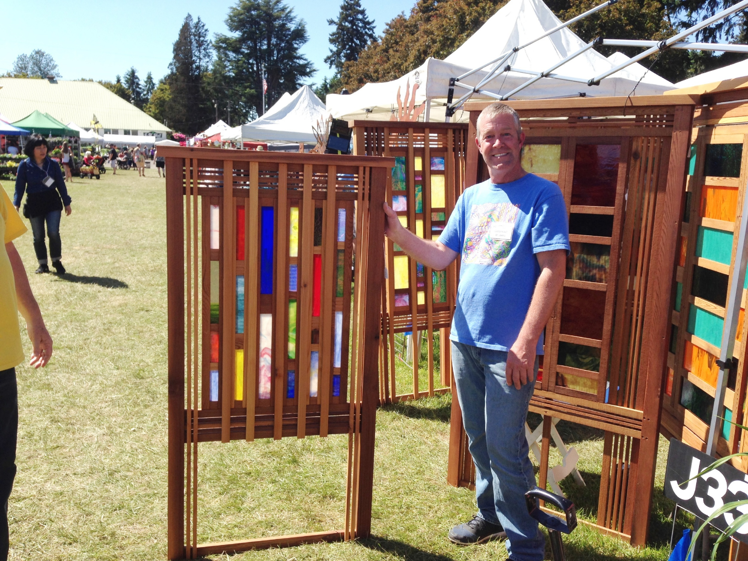 Carpentry and glass artist James Merrigan, of Portland OR, at the Canby Master Gardeners Fair 2016.