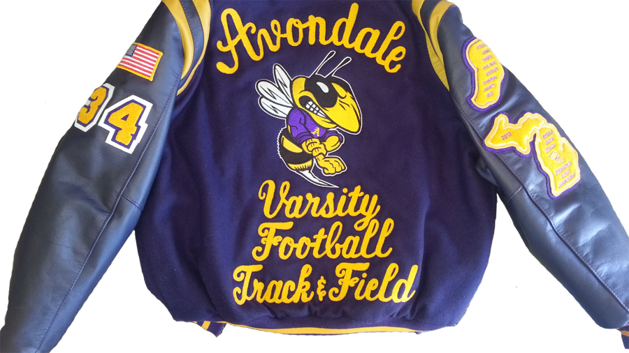 AvondaleFootballTrackField-ChenilleChainstichLetteringJacket-SewPatchesOnSleeves-MensYellowJacket-wb.png