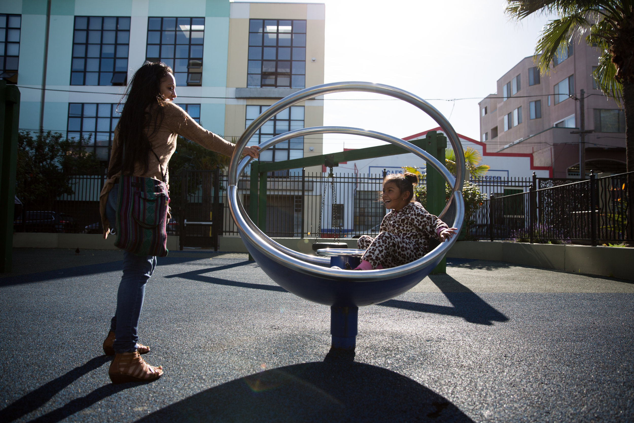  Julia and Guillermina play at the park near Guillermina's school. Julia has been taking classes at San Francisco City College after work, but decided to take the summer off, which has given her more time to spend with her daughter. She says that Gui