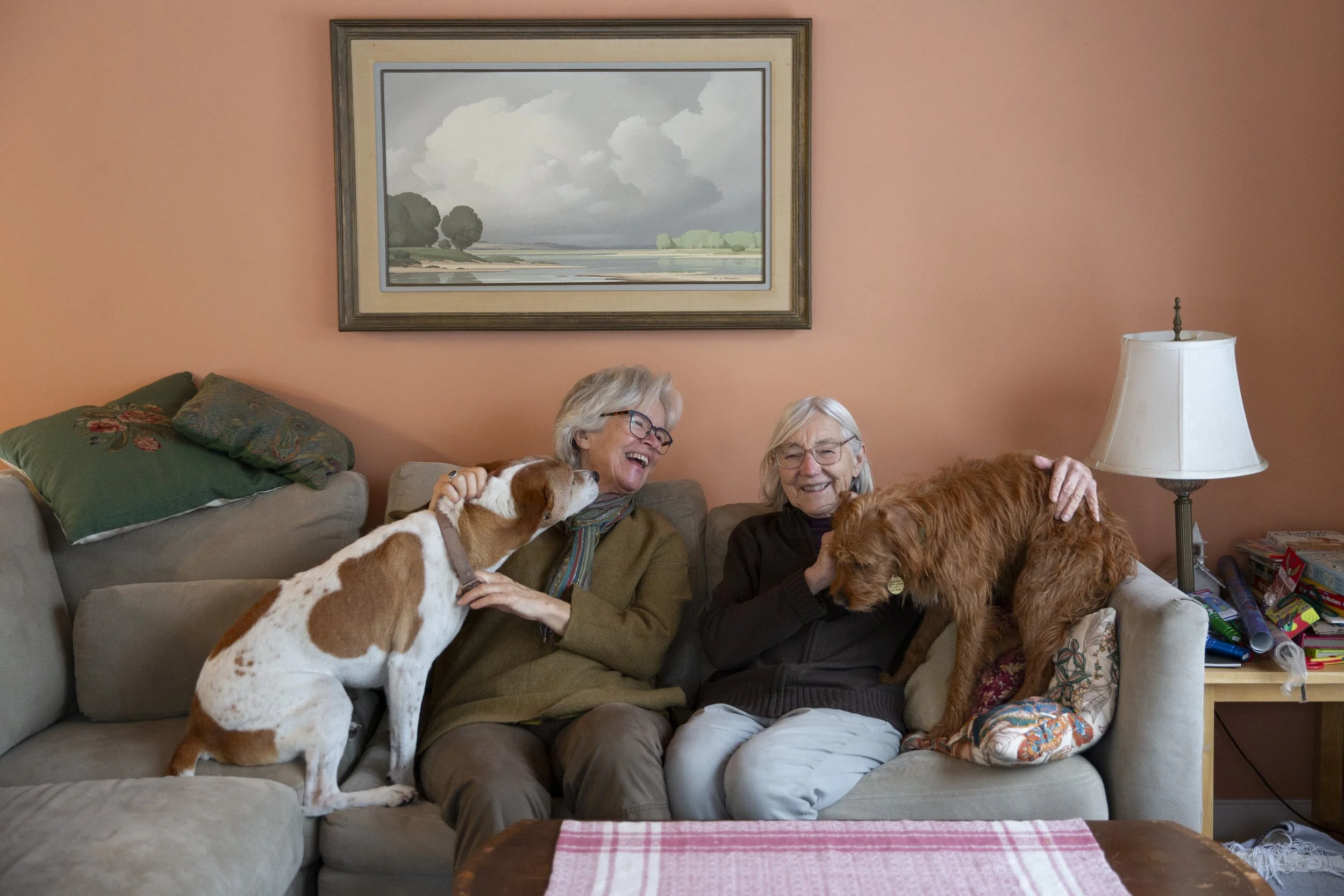  Amy Peberdy, center left, and Virginia Barlow, two of the four founding members of For the Land Publishing, which produces the Vermont Almanac, are joined on the couch by Earl, 10, left, and Claire, 1, at Barlow’s home in Corinth, Vt., on Tuesday, D