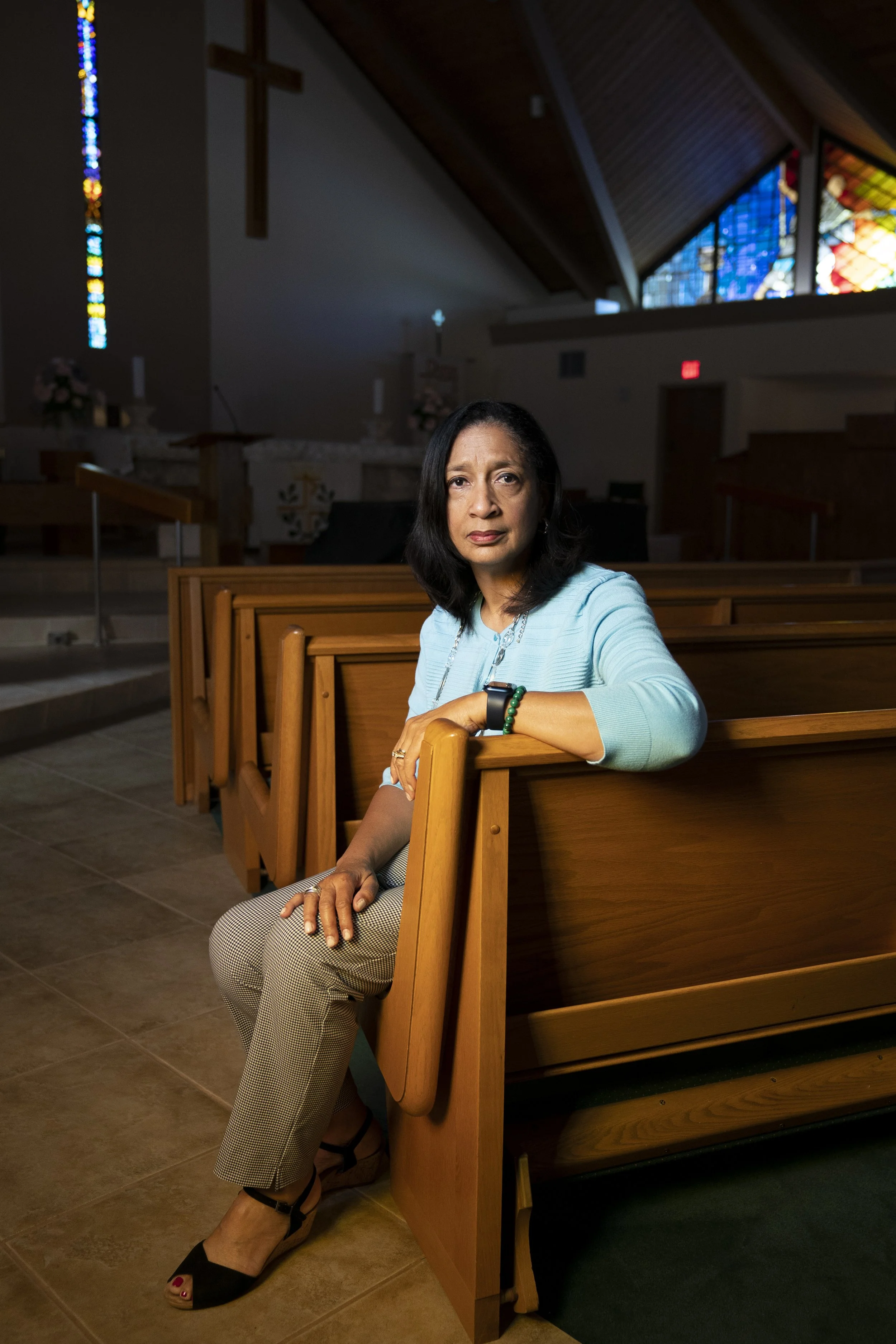  Theresa Shaw, executive director of Emmanuel Lutheran Church, in the church's sanctuary in Naples on Wednesday, April 21, 2021. Shaw is leading a coalition of churches in Collier County to help register people for COVID-19 vaccinations, especially i