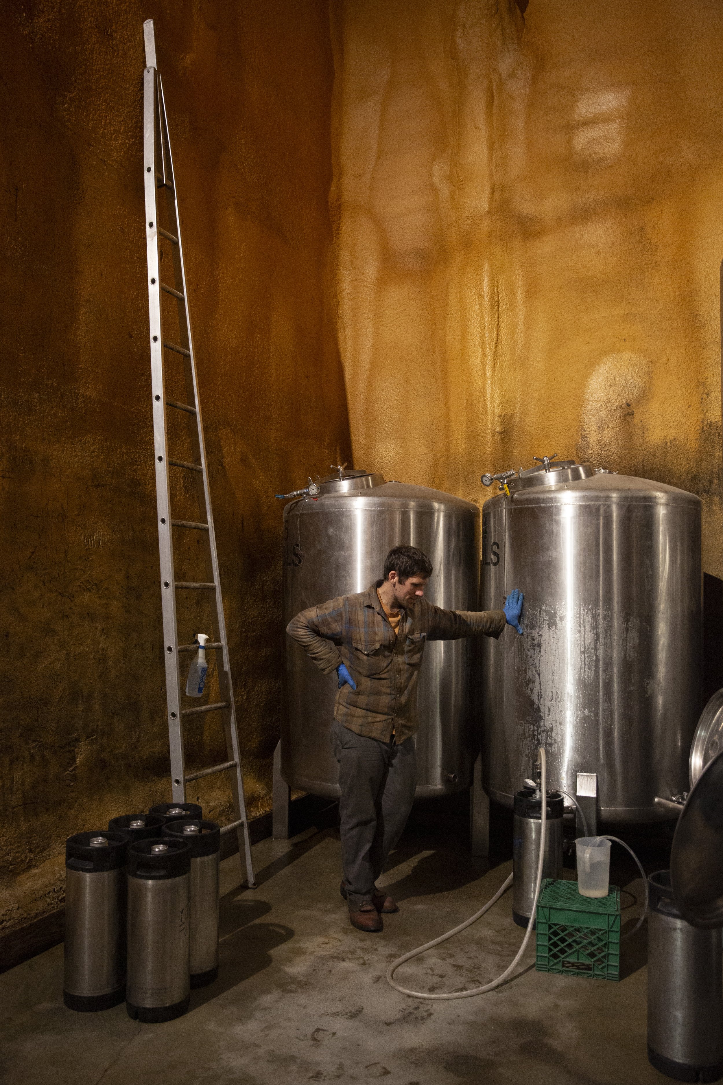  Orchard Manager Shane Teveris fills a keg with hard cider at Poverty Lane Orchards in Lebanon, N.H., on Wednesday, August 16, 2023. The orchard lost its entire crop of pick-your-own apples, but the apples used for alcohol faired better in the frost.