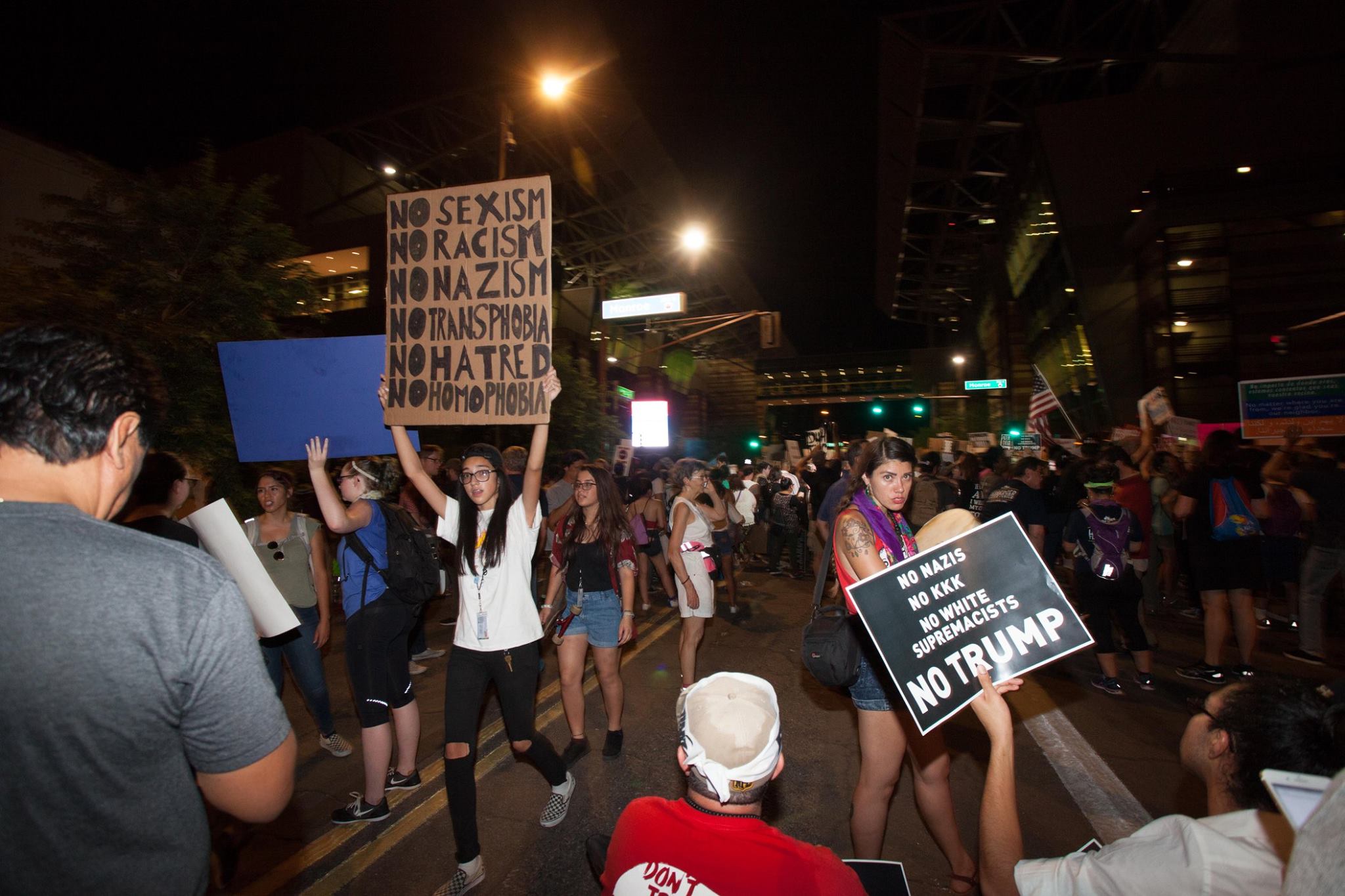 tom martinez 20 march crowd signs.jpg