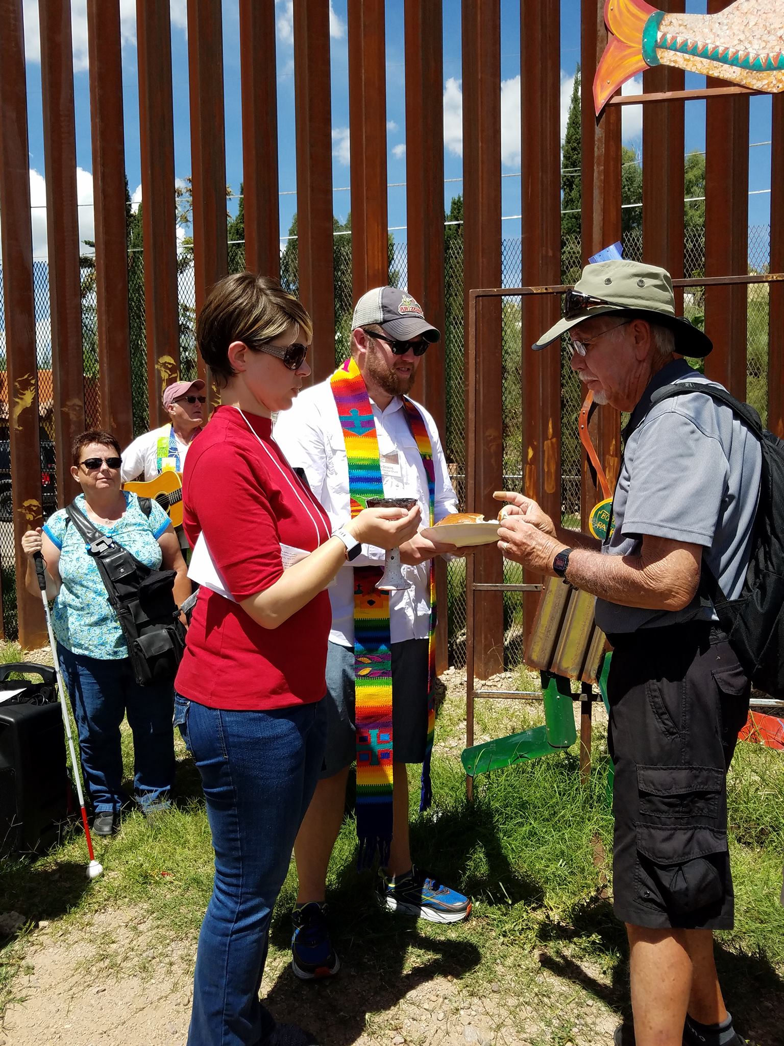communion at the border wall by rebecca dickinson.jpg