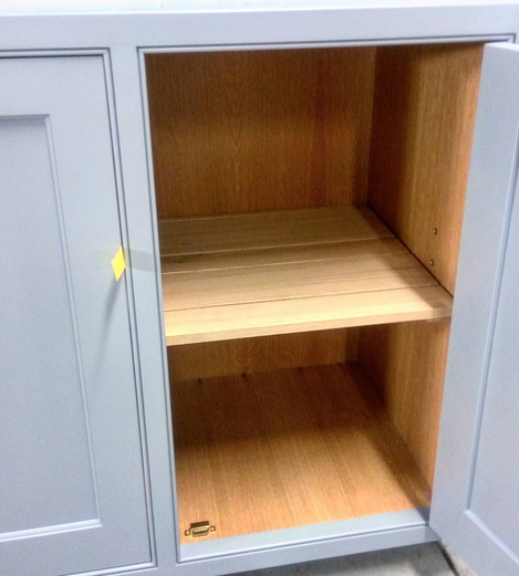 These gorgeous real European oak cabinet internals exude quality from the inside out. The random width slatted solid oak shelves and adjustable brass shelf pins not only look fabulous,, but are also incredibly long lasting, and will keep this kitchen both functional and beautiful for many years to come.