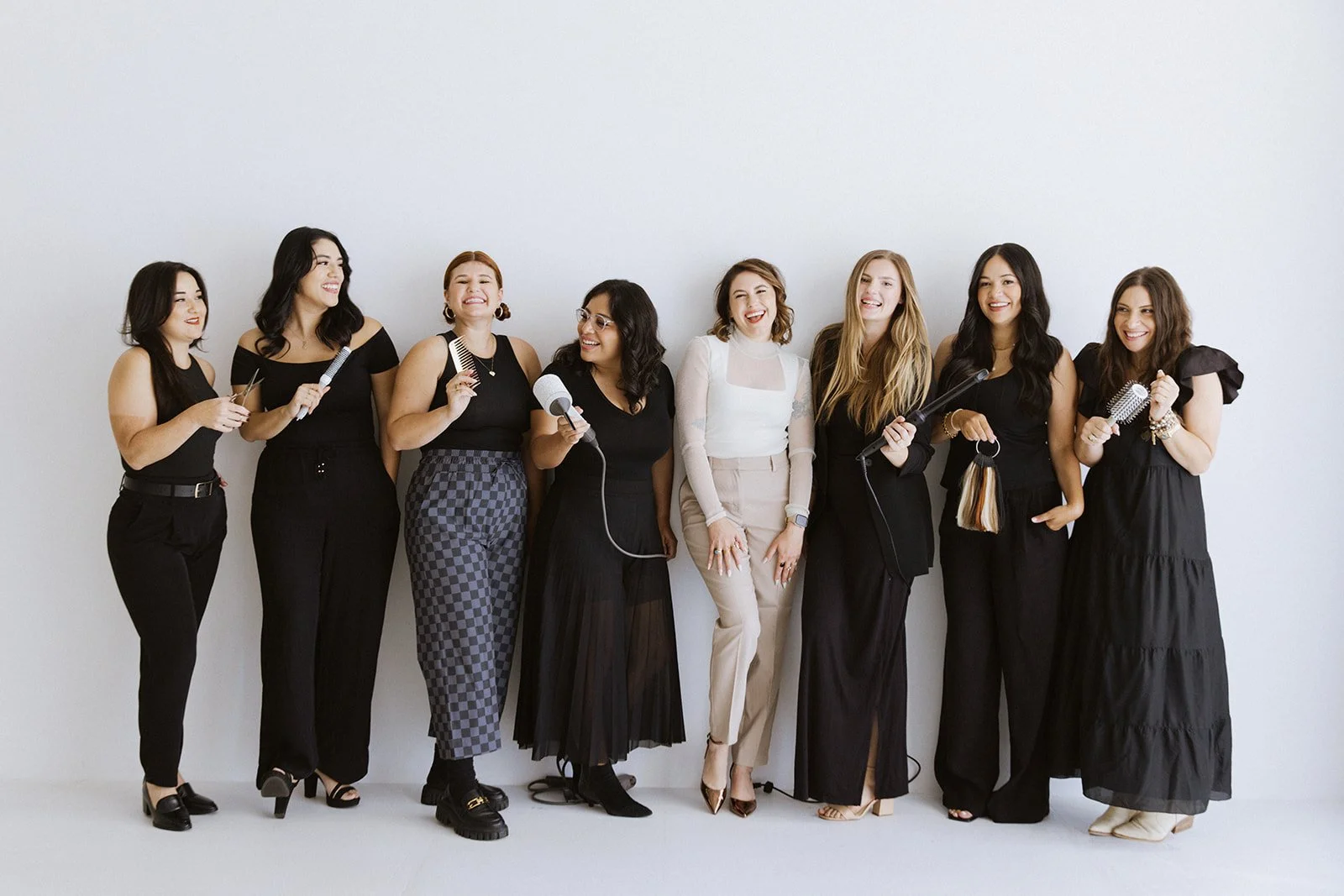Just Lago beauty and wellness team standing together for a group portrait.
