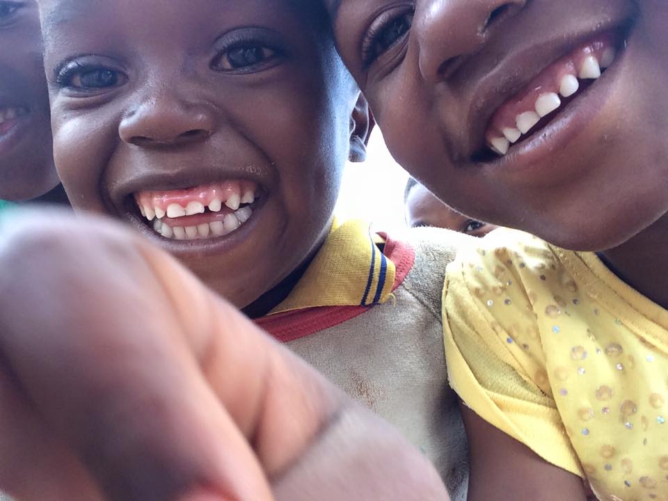 Children in Singida region, Tanzania,&nbsp;clamour for an iPhone so they can see a picture of themselves. (Laura Payton)