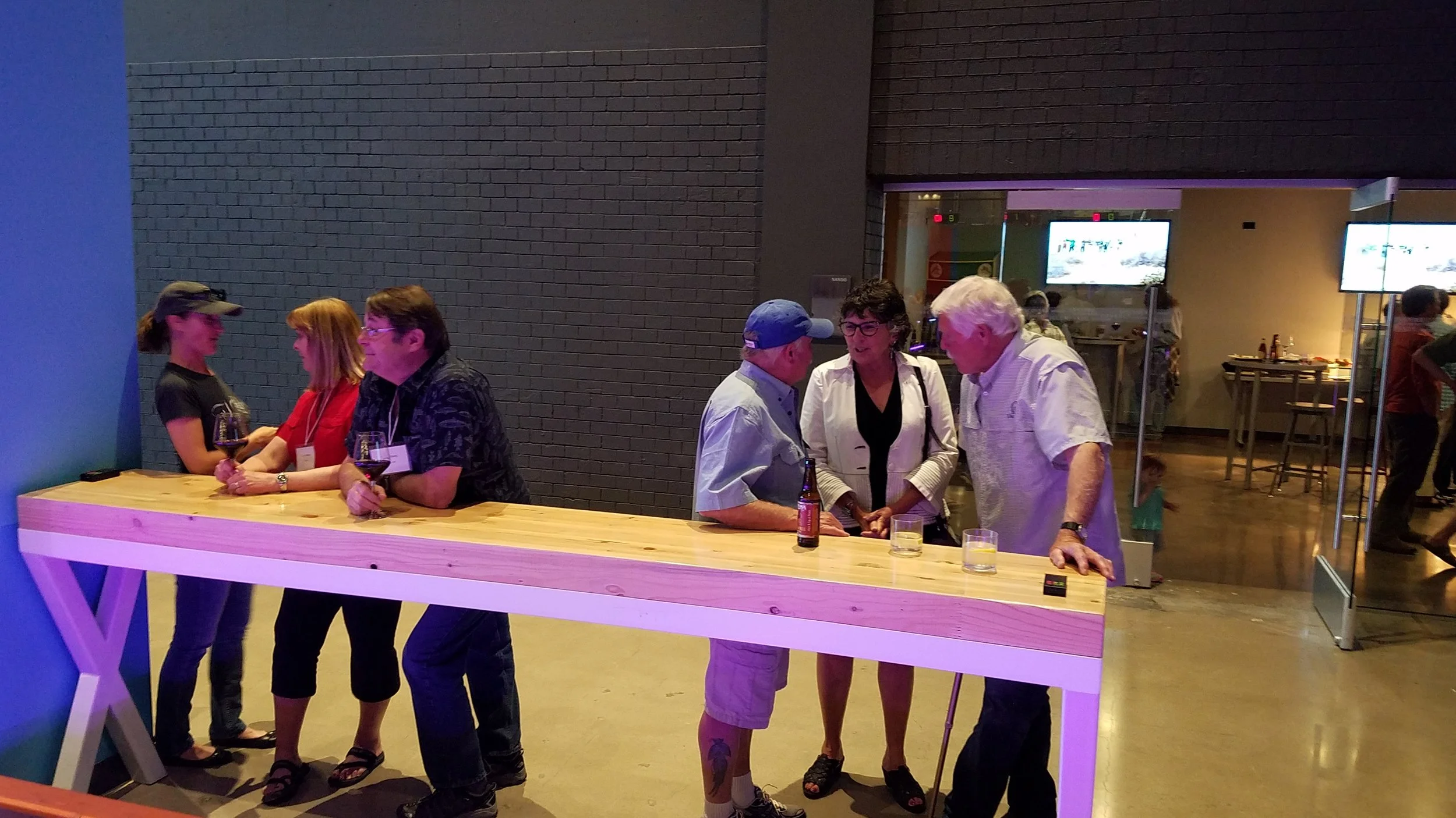GBBO president Willie Molini and friends probably not discussing bocce ball. Photo by Martin Swinehart.