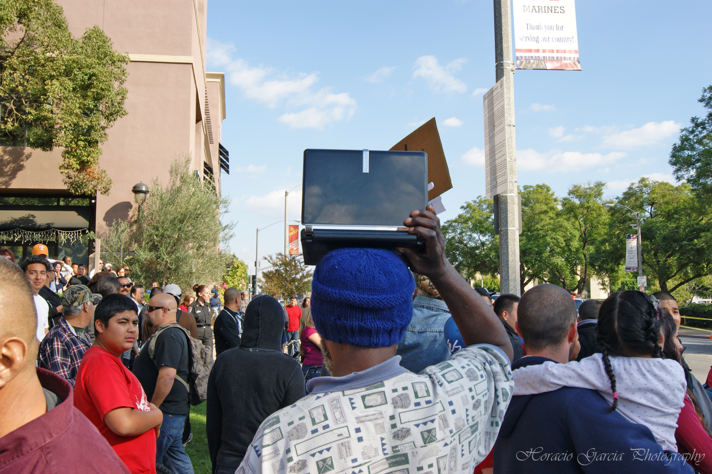 I never DID figure out why this guy walked around the entire time with a laptop on his head