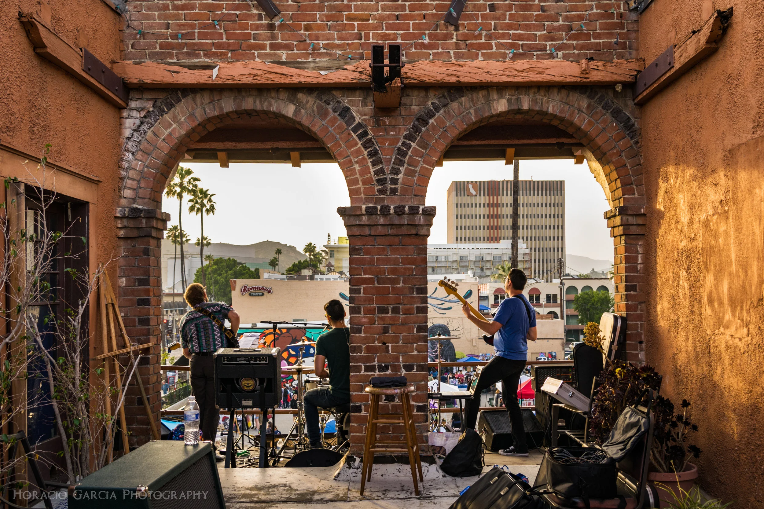 Musical Act “Traitor Joes” perform from the balcony of the Life Arts Center in Downtown Riverside during the monthly Riverside Art Walk