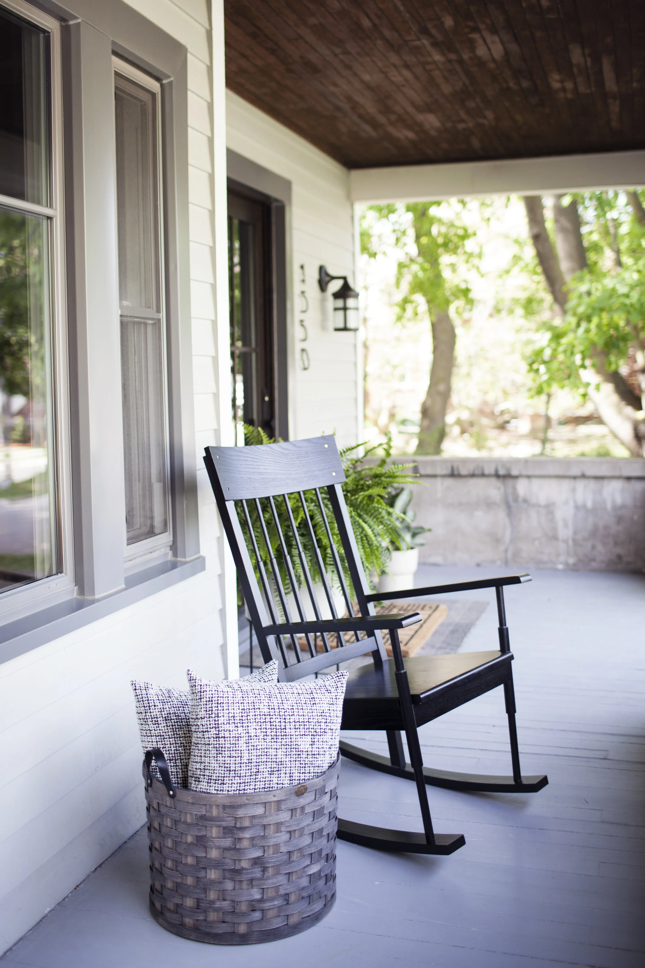 Our dream house must-haves include: a porch, rocking chair…and