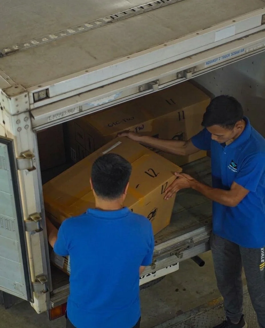 arranging shipping boxes
