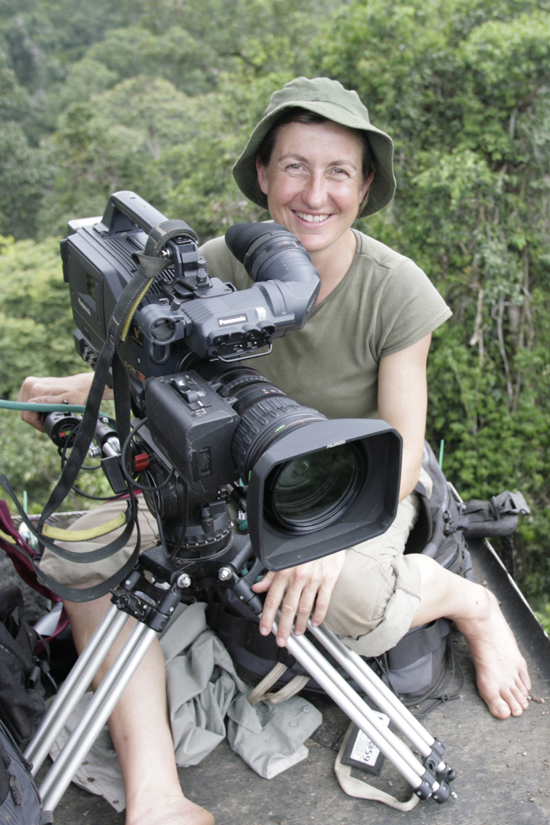 Justine Evans on location up a tall tree.
