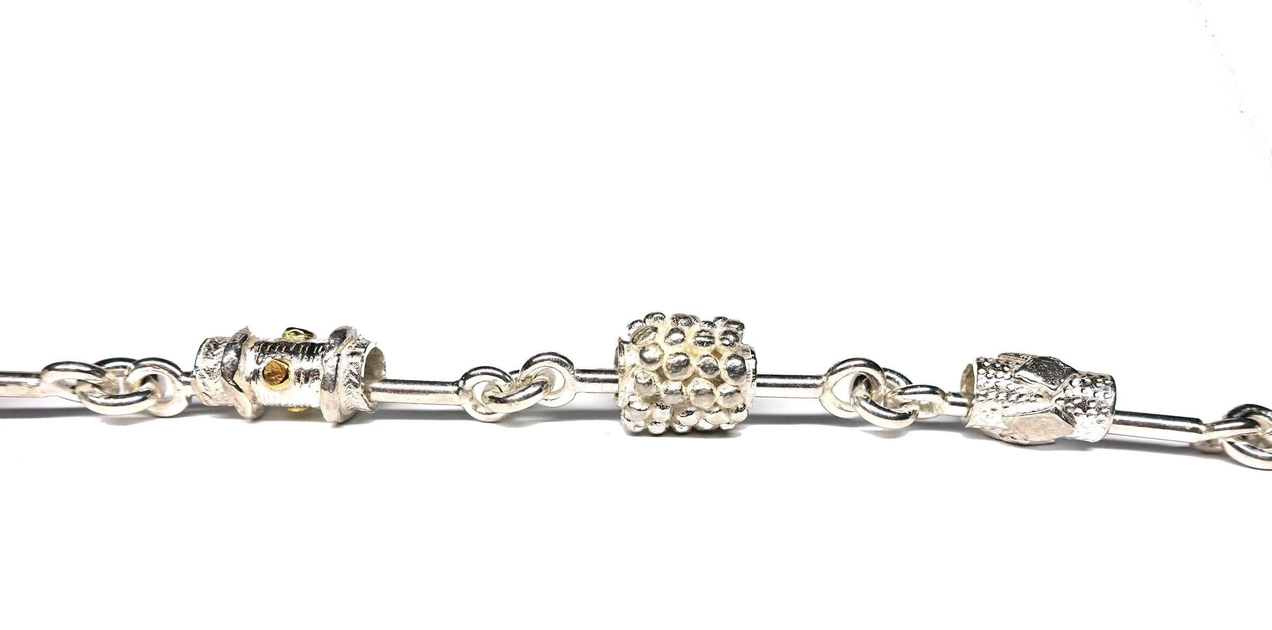 handmade_silver_charm_bracelet.jpg
