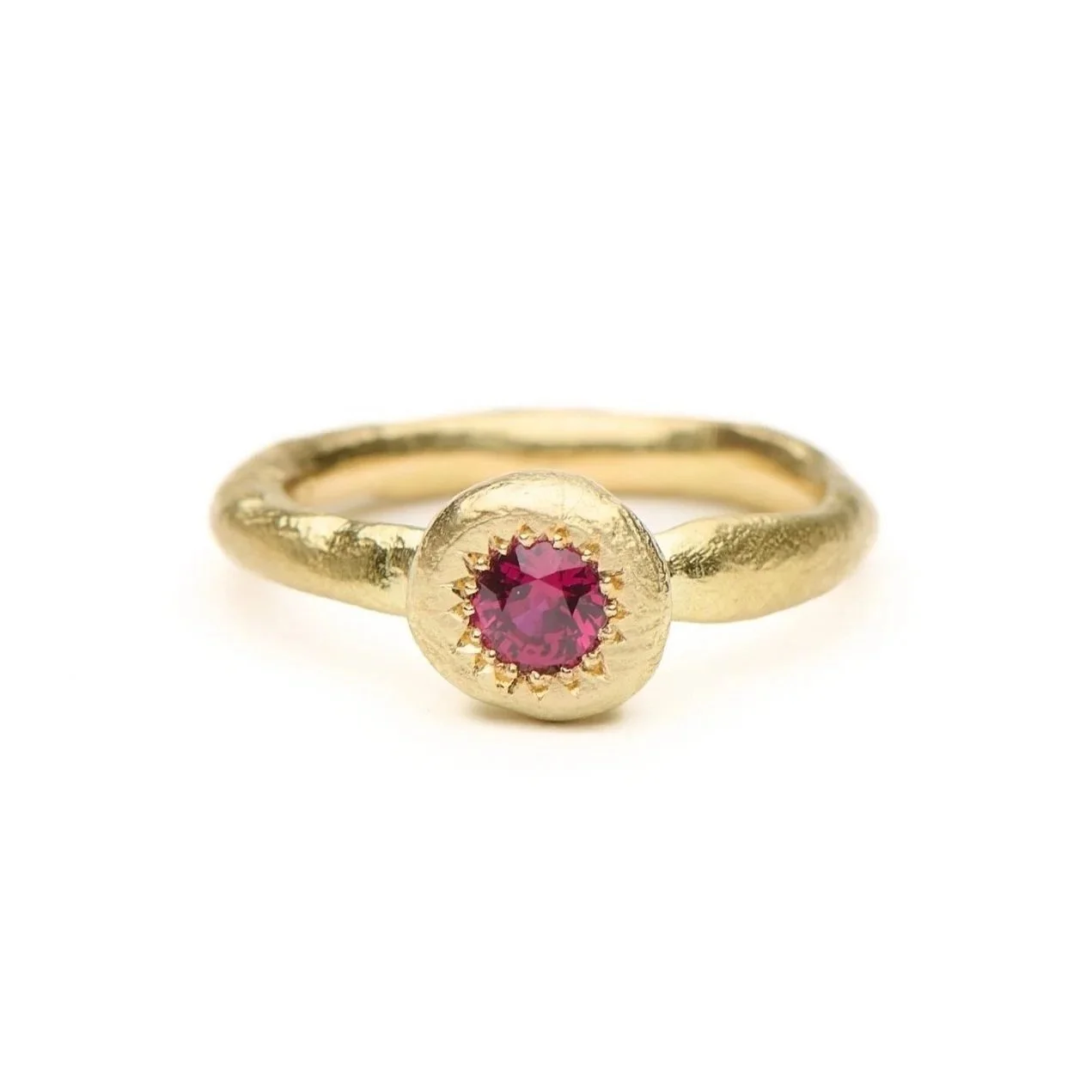 18ct yellow gold To Hold ring set with a ruby.

In the realms of folklore, rubies are seen as the gemstone of love.
The rich red, like blood is life force, full of vitality and passion.

This ring is available to purchase through the studio. The To H
