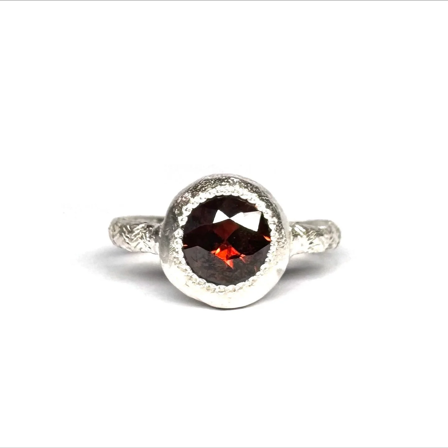 #118.
Handmade sterling silver ring set with an amazing 7.8mm round orange Australian zircon 2.12ct. This ring has been hand engraved.

Please get in touch (DM or email) for information regarding resizing!

#unique #oneofakindjewellery #katherinebowm