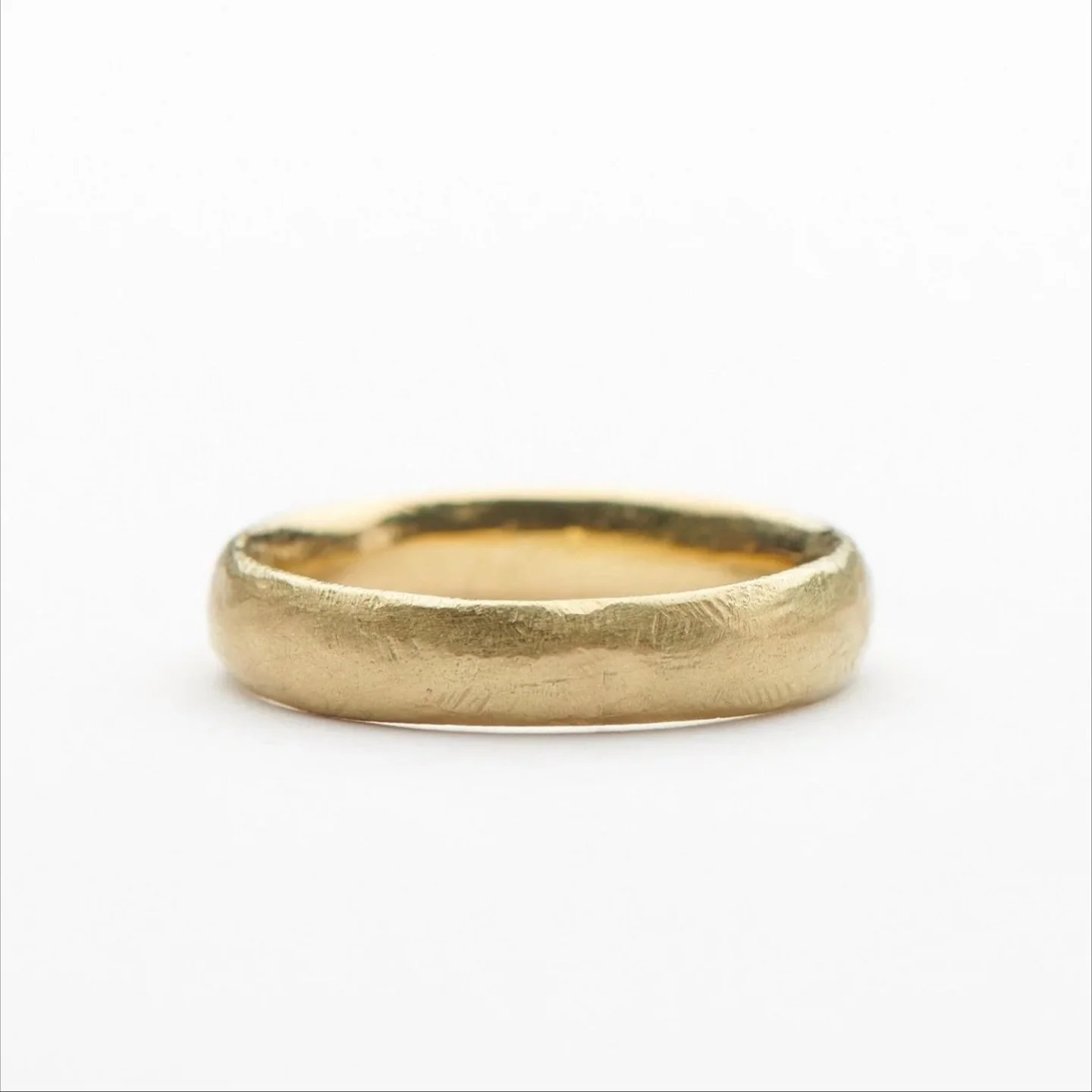 File Mark Wedder.
I have been making variations of this ring for more than 20 years. Each one is hand carved.
This ring is just under 5mm wide and has a comfort fit, so is very easy to wear. A strong robust ring, made to be worn every day.

In the la