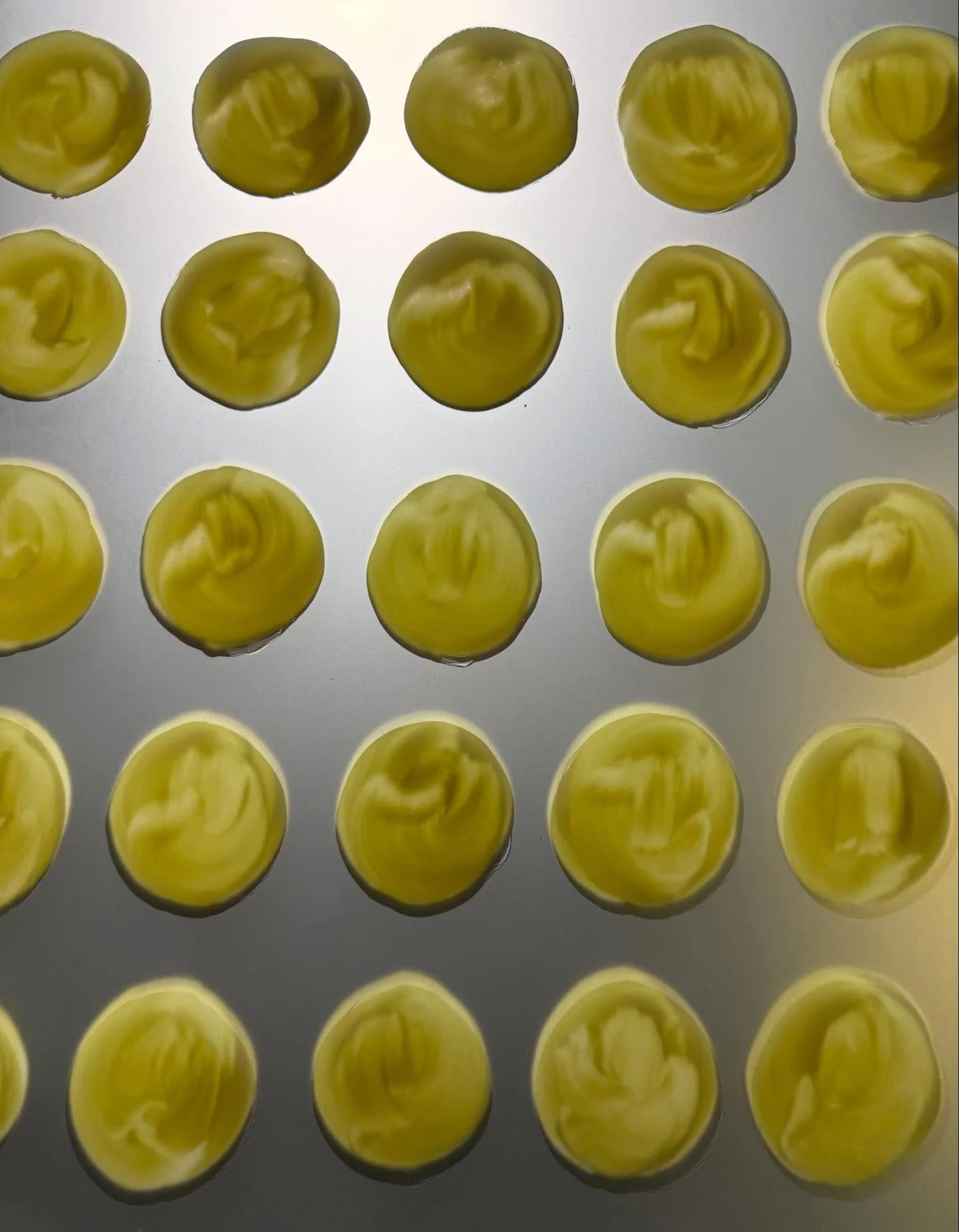 I painted dots on my window. This was meant to be the first coat then I was to block it out with a second coat, but I liked the pattern that the simple act of quickly doing a circle looked, the brush strokes showing the action.
This is at night. Lumi