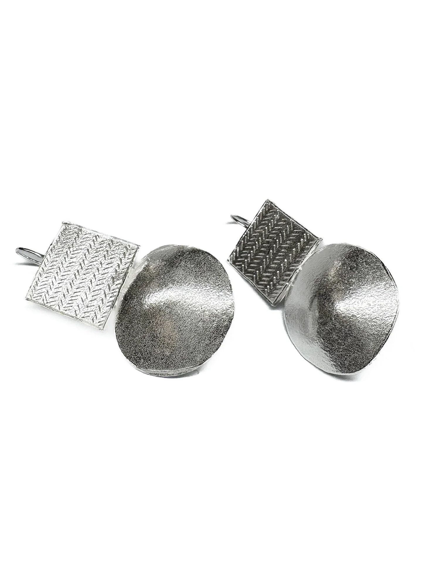 Sterling silver earrings.

Delivered to @egetal.
Each pair is unique, and each earring is unique! They were made together so are similar but not exact replicas.

#handmade #bespoke #jewellery #oneoff #earrings #sterlingsilver #katherinebowmanjeweller