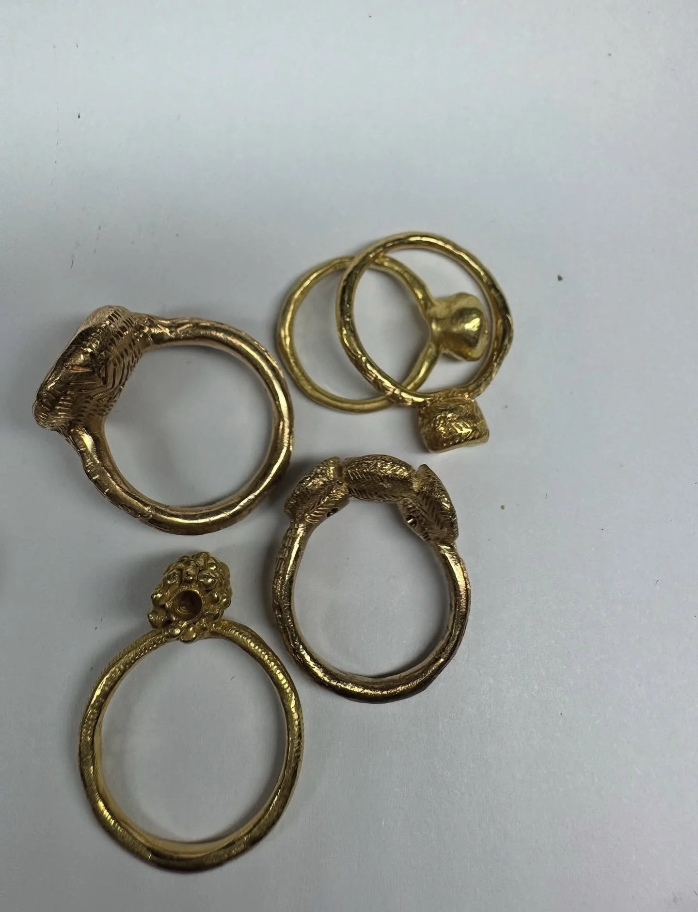 Granules of gold and hand engraved details. Rings handmade in 9ct and 18ct yellow gold.

#95 (Magic Ring)
#75 Ring
My Constant Ring 
My Beloved Ring
Encens Ring

These rings are available online and ready to be shipped now. Please let us know if you 