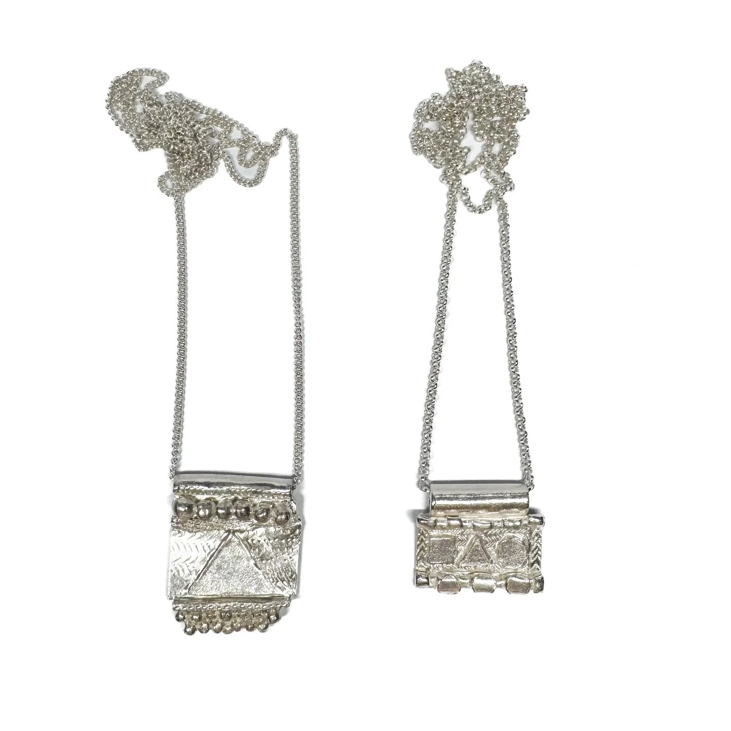 #135 and #140.
Handmade sterling silver pendants with hand engraving.
Series of One.

Available online and through the studio, open by appointment.

#katherinebowmanjewellery #silver #pendant #oneoff #amulet #uniquejewelry #supportsmallbusiness #hand