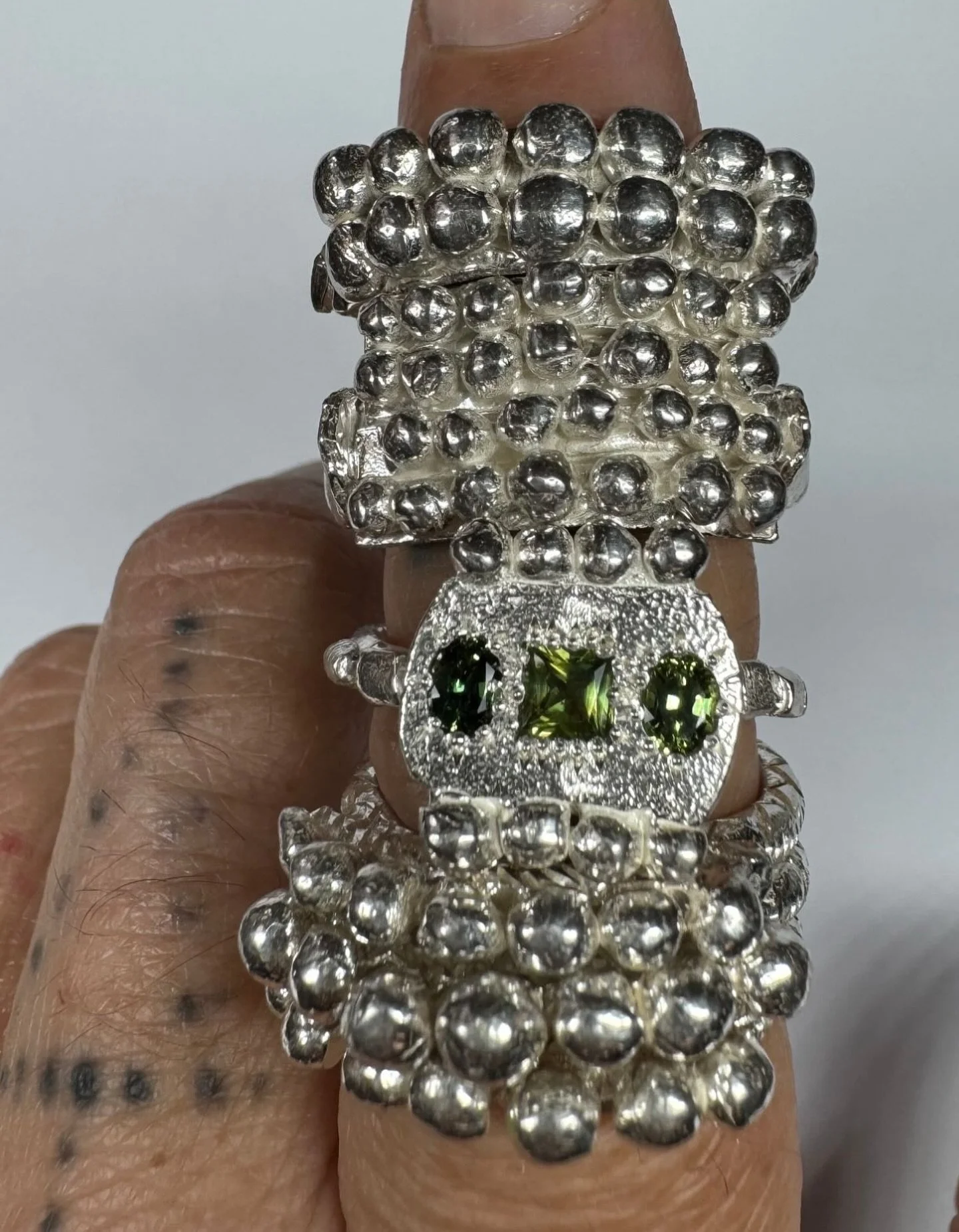 Ring Stack!

#131. Handmade sterling silver ring with hand engraving.

#136. Handmade sterling silver ring with hand engraving.

#139. Handmade sterling silver ring set with 3.5mm square and 2 &times; 4&times;3mm oval natural Australian sapphires.

T