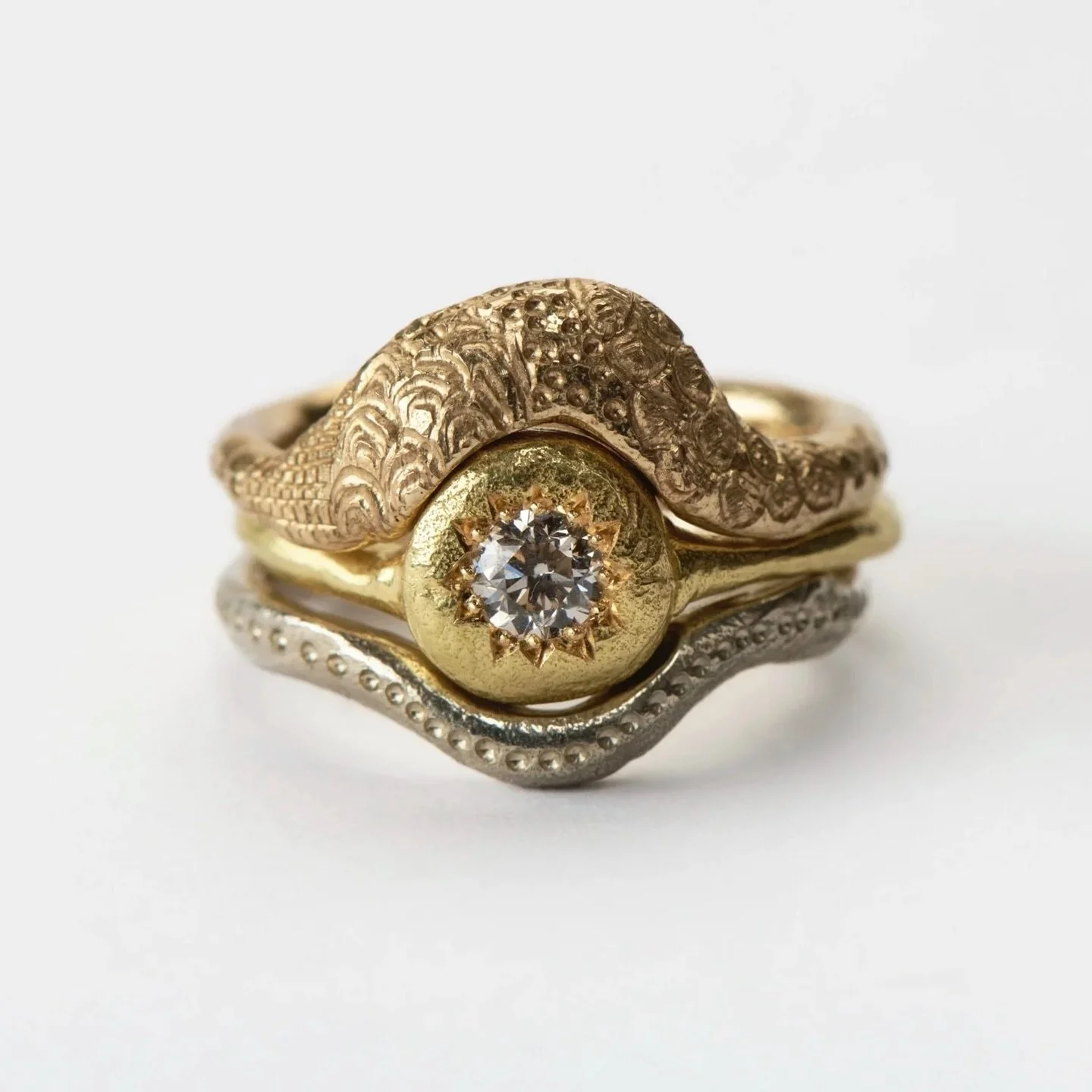 I write a new book everyday
the love theme for the wilderness.
 - Stay by The Blue Nile. 

These three rings were created as a set; however, they can also be worn alone or in different combinations with other rings.

I like to think that a love theme