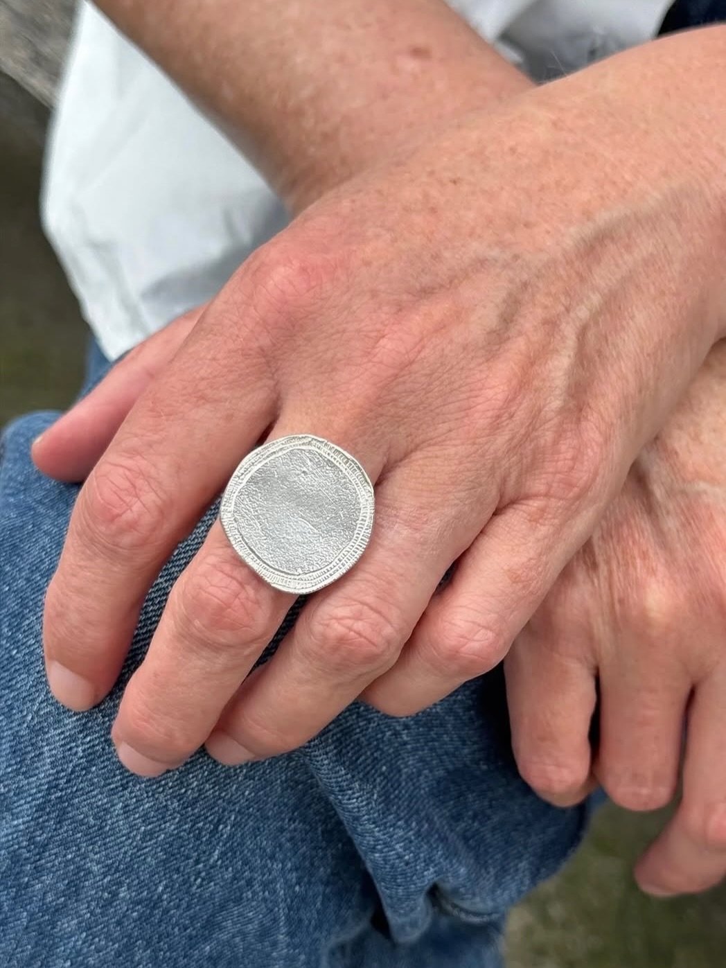 The Peacock Ring.

It is called &lsquo;Peacock&rsquo; because the underside is engraved with feathers. This particular ring is also set with a secret ruby on the underside, just for its wearer.

Worn here by both @chitramusic and @ciaociaopops ✨

Ava