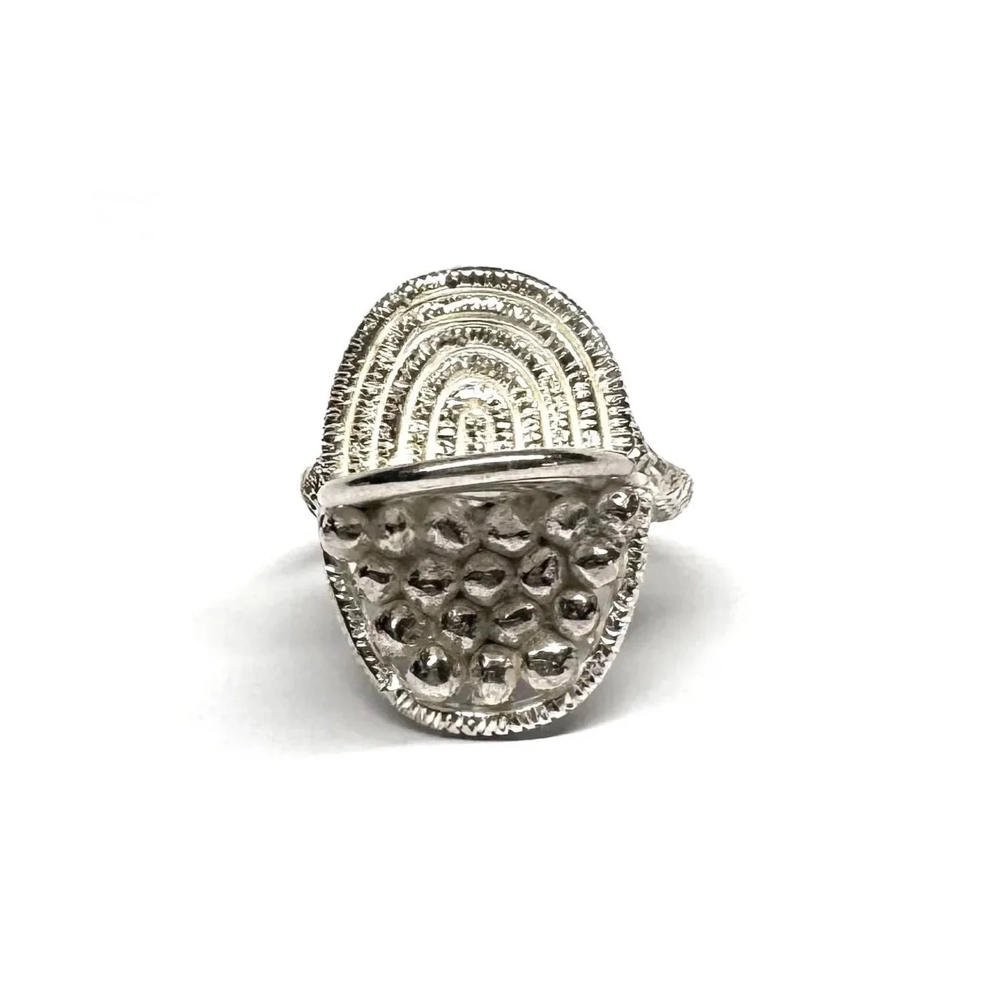 #147.

Handmade sterling silver ring with hand-engraving.

Standard size: c. O
*This ring can be resized. Please email for sizing information.
Measurements: top of ring c. 16.5mm &times; 22.5mm height 10.5mm, width of ring shank - c. 2.2mm

This piec