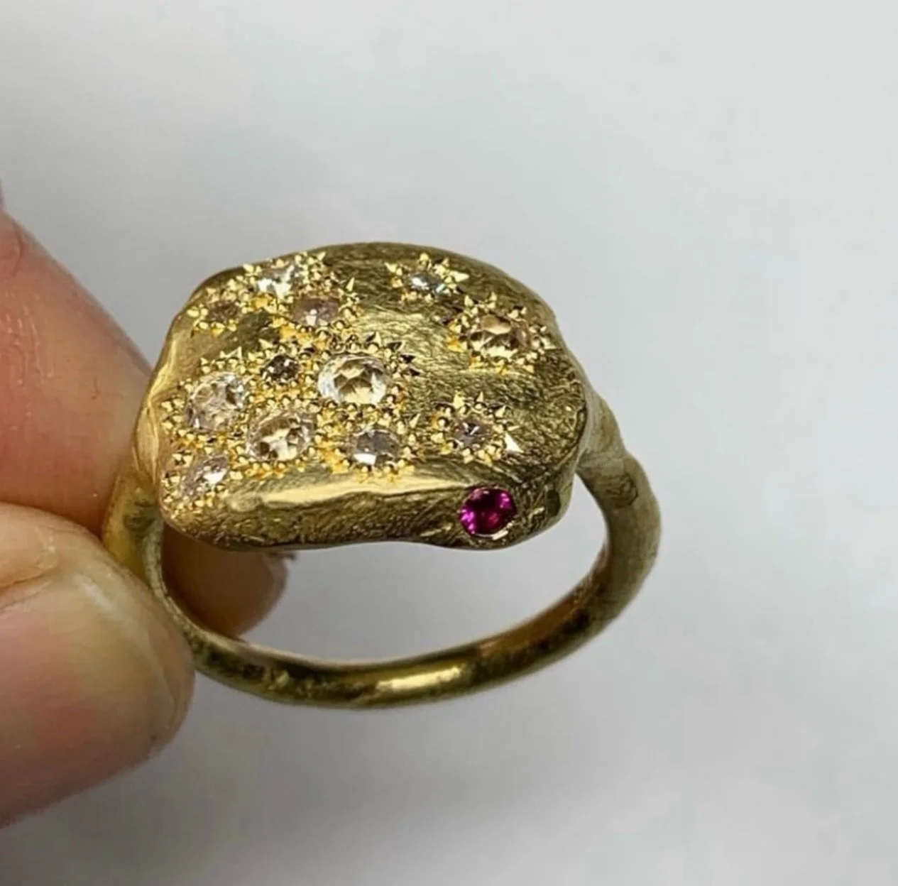 A diamond treasure from the archives.

This 18ct yellow gold ring was set with diamonds collected over many years by the clients grandfather.

A wonderful collection of old cuts in various sizes, colours and shapes.

A special ruby also added to the 