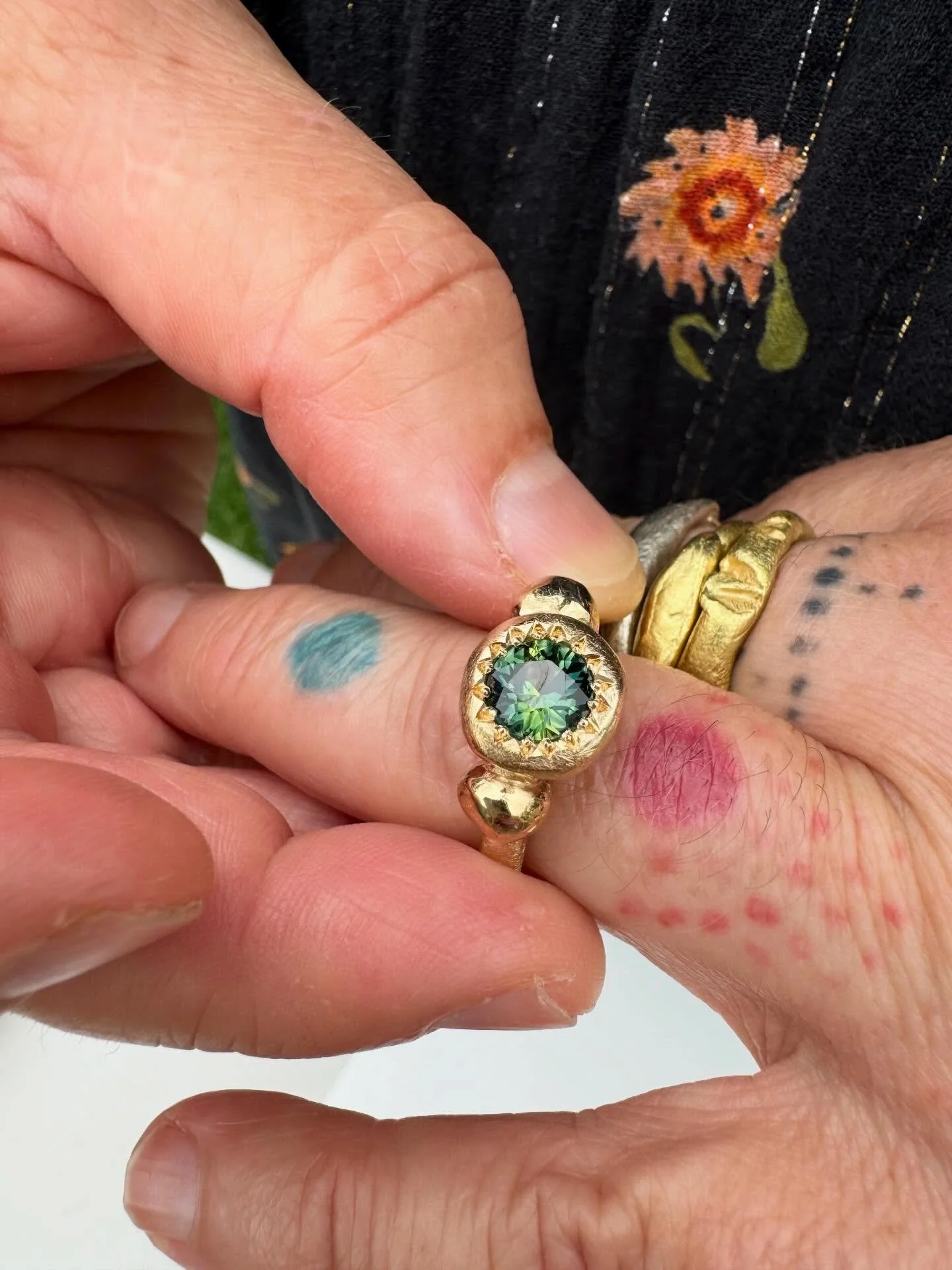 9ct yellow gold Metier ring set with the most beautiful natural Australian parti sapphire.

I named this ring Metier because the ring is strong and sure. Metier meaning an area of activity in which a person excels.

The setting here is heavy! The lar