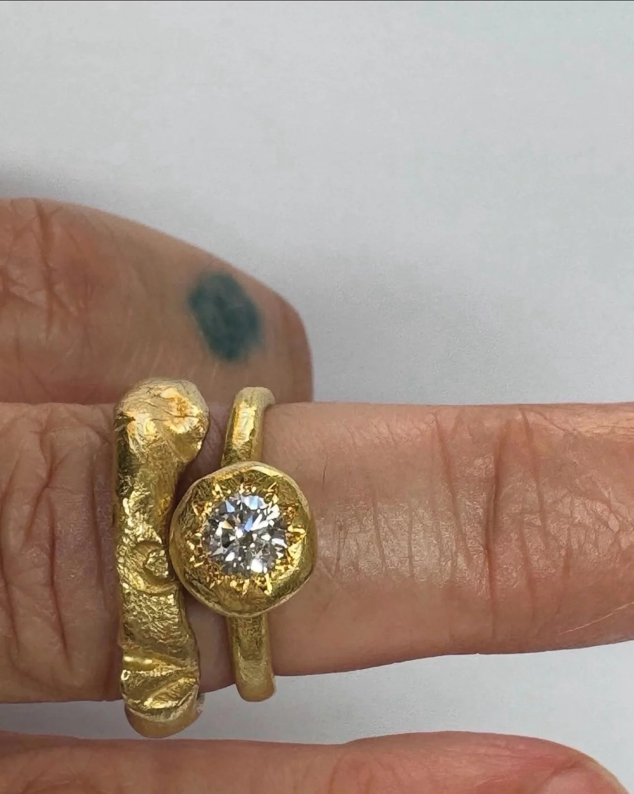 Unexpected combinations. 

The My Beloved ring is intentionally organic in nature. Love is not perfect. A ring representing love need not be perfect either. The imperfections allow you to see each other, or in this case, see each individual ring.

Ha