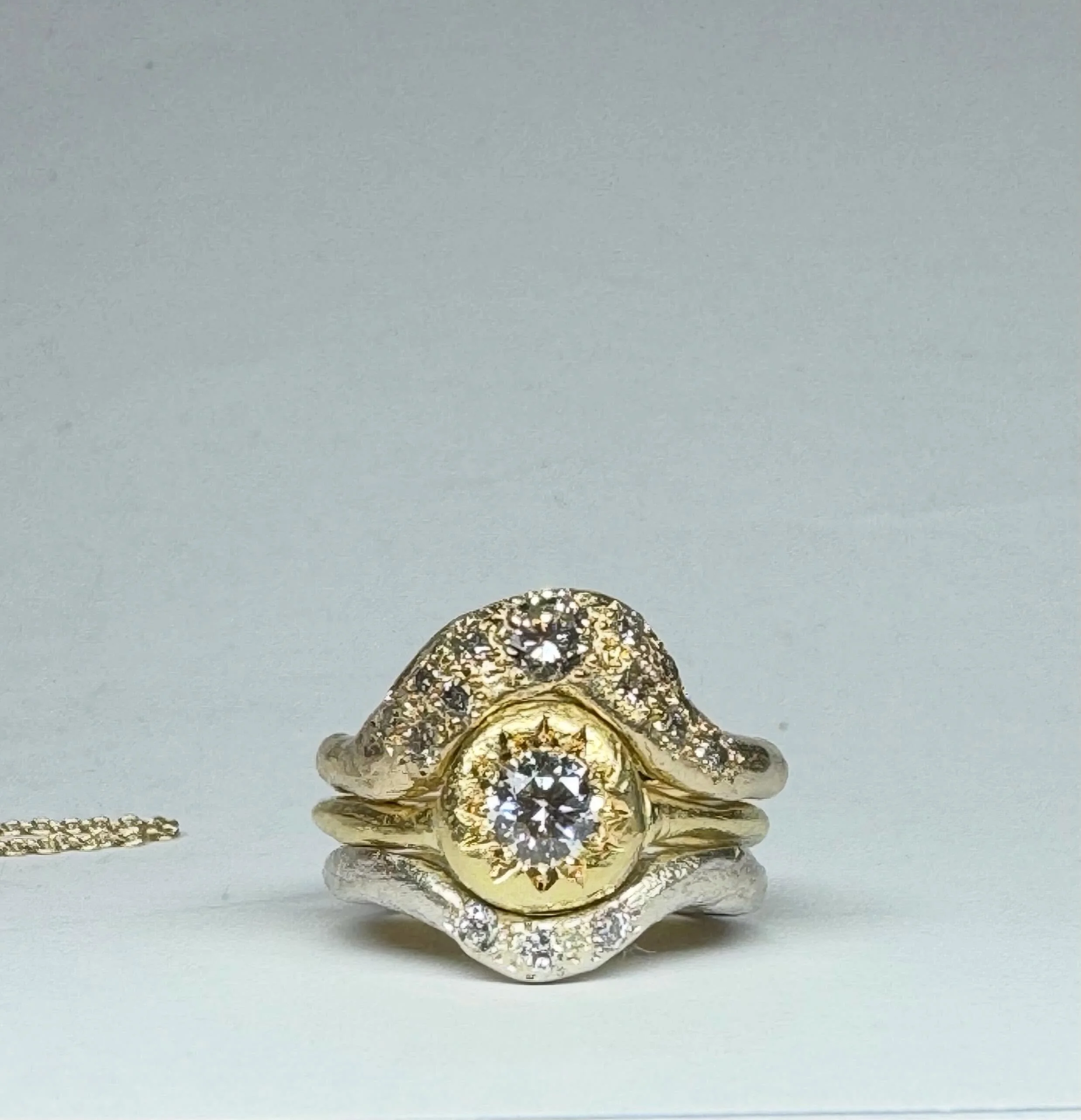 Rings for Nikki.

These three rings were based on my Love Theme for the Wilderness rings. Three autonomous rings which also fit snugly with each other. 
I posted previously a bespoke commission for my friend Gemma based on this design. And then had t