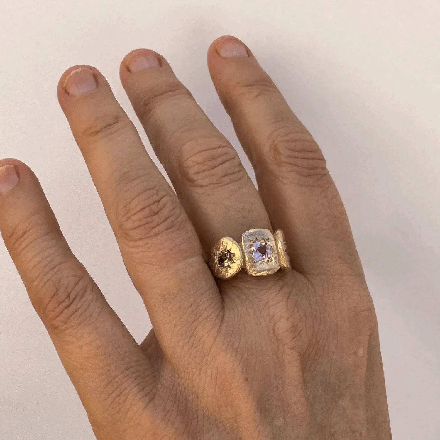 My Constant Ring
9ct yellow gold set with 4.5mm square cushion cut pink sapphire 0.46ct, 2 x 4mm round natural Australian yellow/green parti sapphires.

The My Constant Ring is available online now. Link in bio. Please get in touch if you would like 