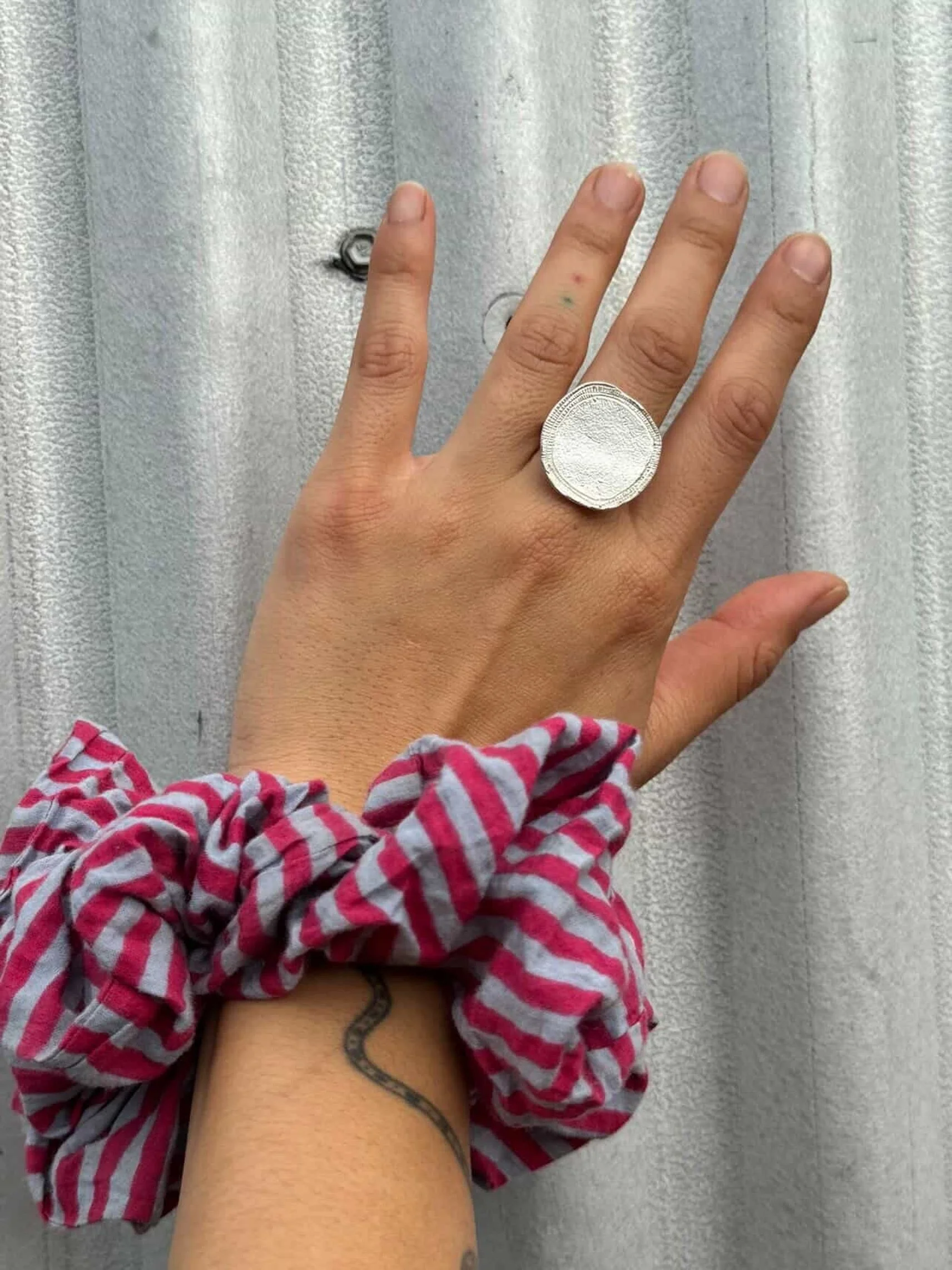 The Peacock Ring.
It is called &lsquo;Peacock&rsquo; because the underside is engraved with feathers.

This sterling silver Peacock ring is available online now - it&rsquo;s has a small ruby set underneath!

Worn here by @magggieluu 🙌🏼💕

If you wo