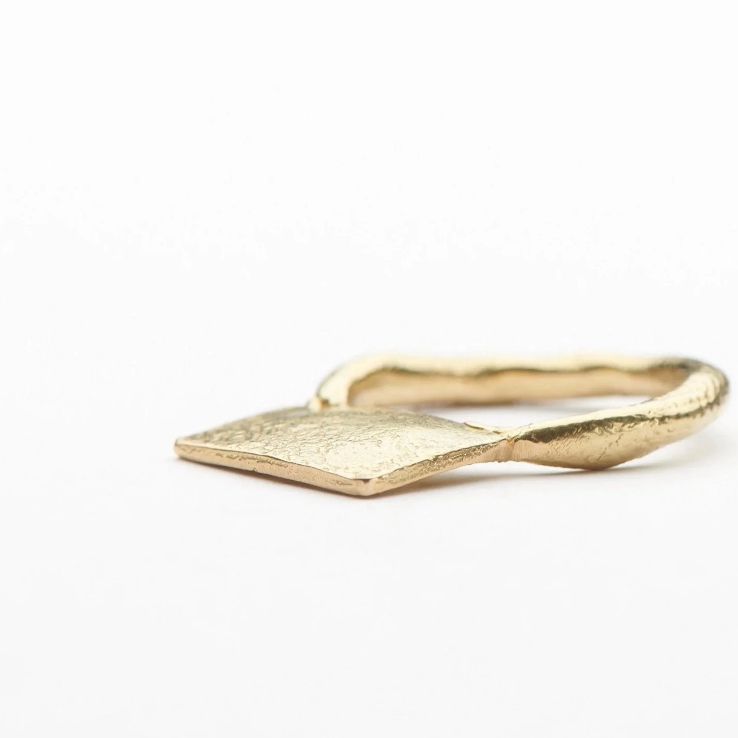 Salutation Ring.
Handmade 18ct yellow gold ring with hand engraving..

Standard size: c. S - S1/2
*This ring can be resized within 2 standard sizes. Please email for a resizing quote and more sizing information.
Measurements: top of ring c. 15mm x 9.
