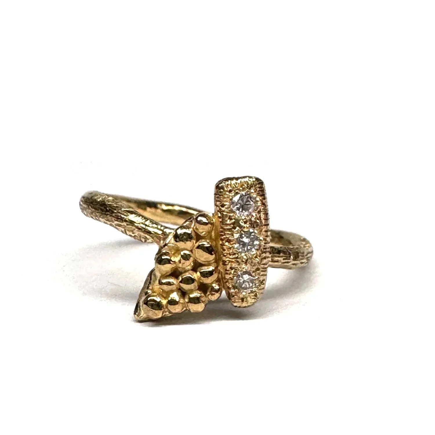 #142. 
Handmade 9ct yellow gold ring set with three diamonds, hand- engraving.

3 x 2mm round white diamonds GSI1

Standard size: c. L 1/2
*This ring can be resized. Please email for sizing information.
Measurements: top of ring c. 8.5 &times; 11.5mm