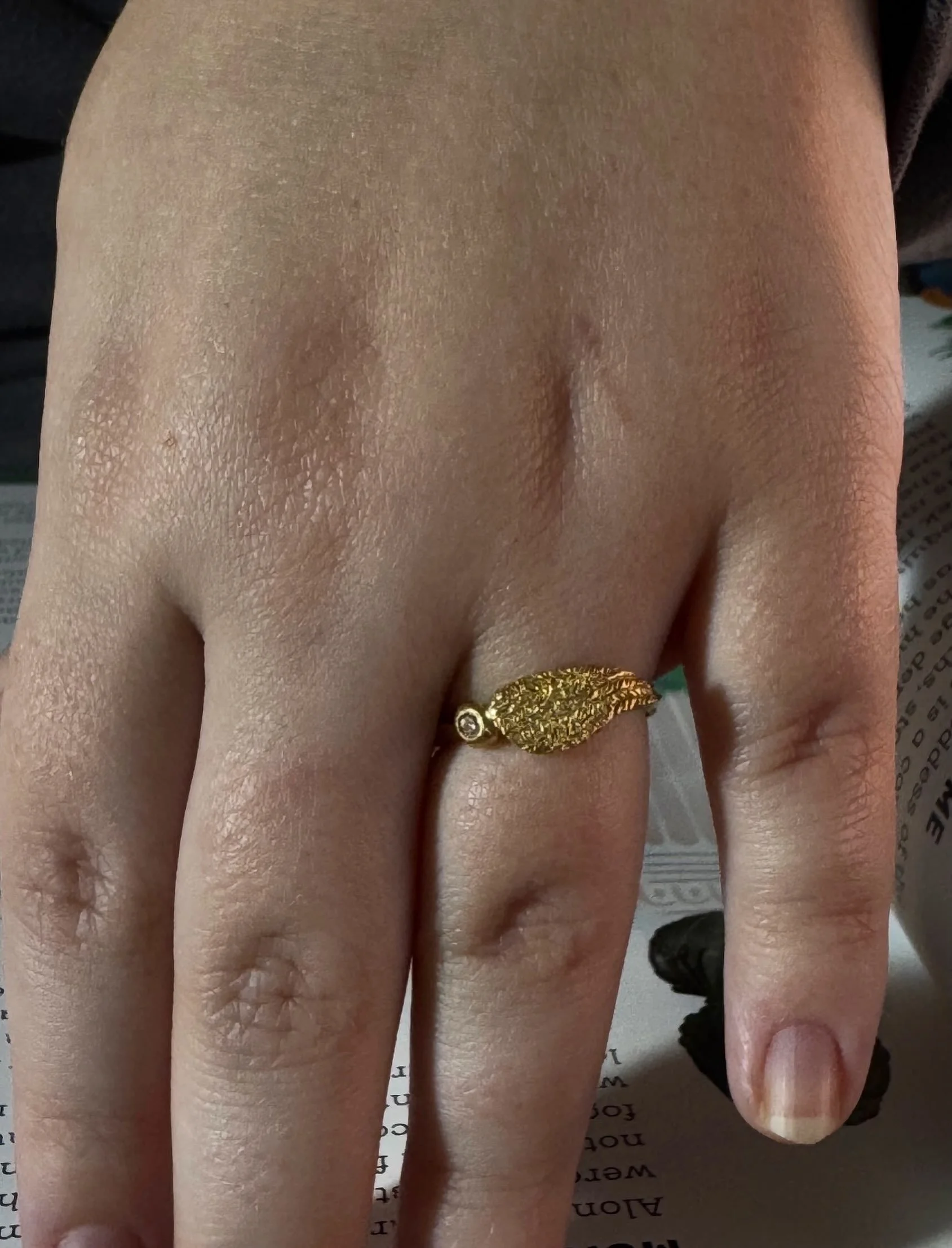 18ct yellow gold Celestial ring set with a diamond.
Worn here by my niece Ava @ajduxson 🌟

It is a golden wing, something precious to wear in the everyday.

There is one of these rings and it is available through my studio.

#golden #wing #precious 