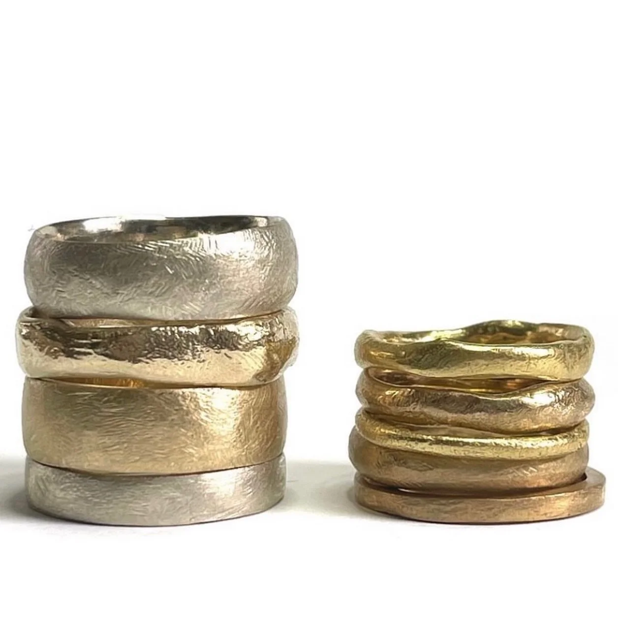 These rings are handmade to be worn by all people. For him, her or them. Custom made for fingers of all shape and sizes. 

Each of these designs can be made in your choice of gold and can be hand engraved. Some of these rings can also be set with sma