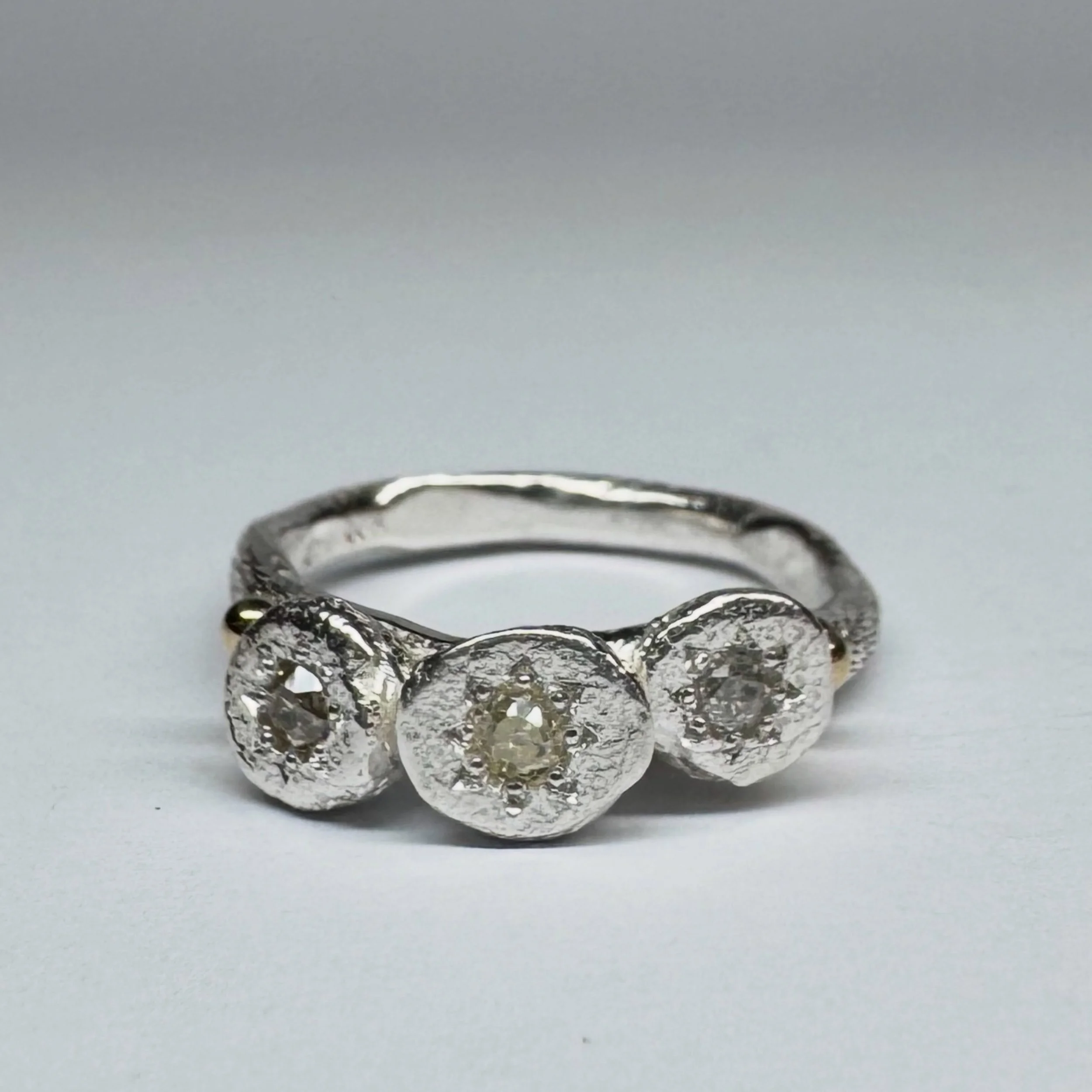 Series of One #175
Sterling silver, 18ct yellow gold, diamonds.

Three unique diamonds, different colours and cuts.

#unique #precious #diamondring #katherinebowmanjewellery